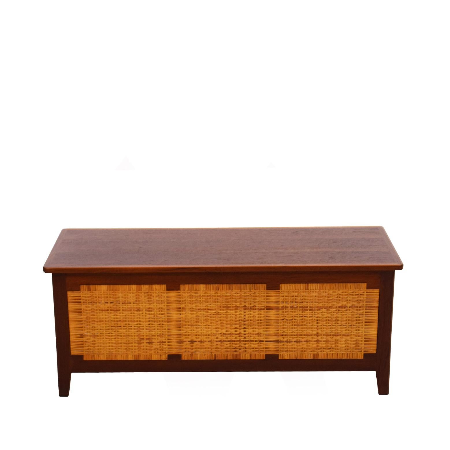Solid teak coffee table / trunk /chest / bench design by Kai Winding for Poul Hundevad in 1950’s

with caning on all sides.