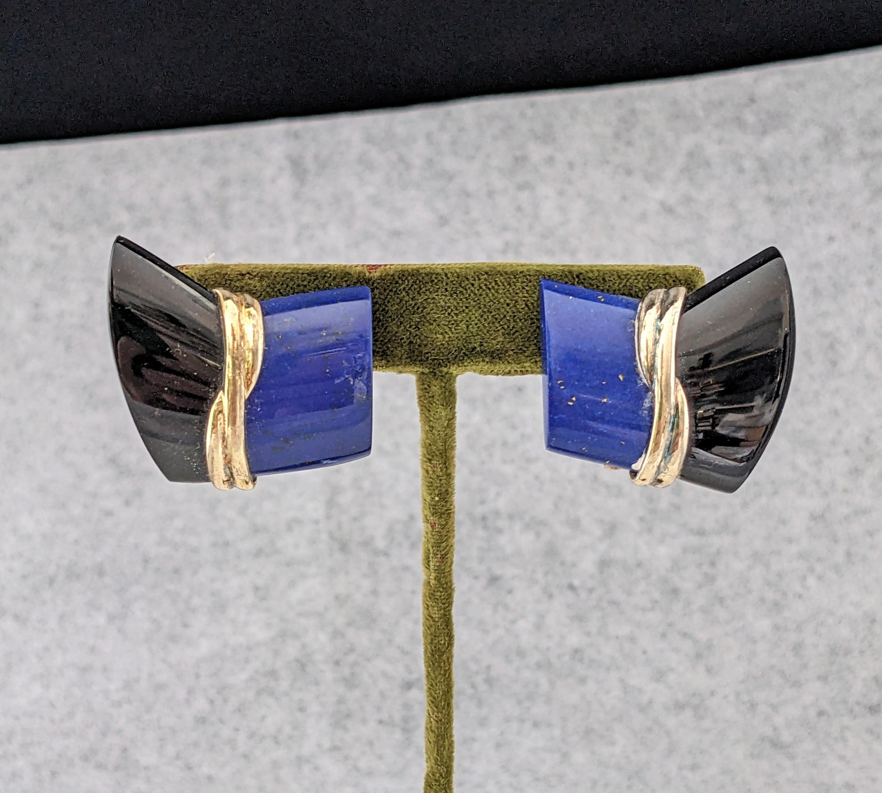Striking Kai Yin Lo Lapis and Onyx Vermeil Earclips from the 1980's. Hand cut gem panels banded in gold washed sterling with clip back and post fittings. 1.25