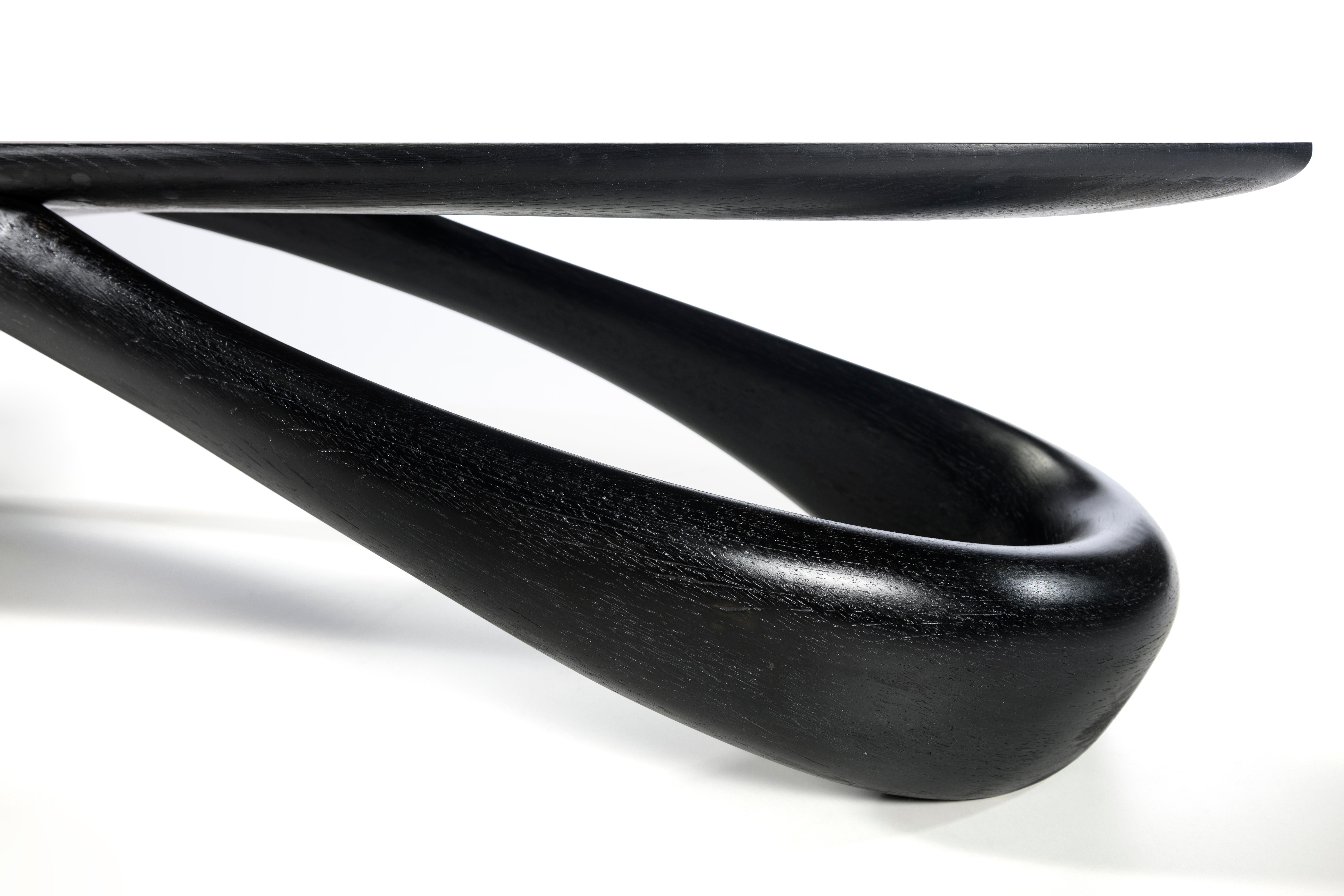 Kaïros Ebonized Oak Coffee Table by Atelier Blouberg
Unique Piece.
Dimensions: D 51 x W 185 x H 30 cm.
Materials: Ebonized oak.

Available in ash and oak. Please contact us.

Ruben Van Lerberghe is a furniture designer and maker. He was born in Cape