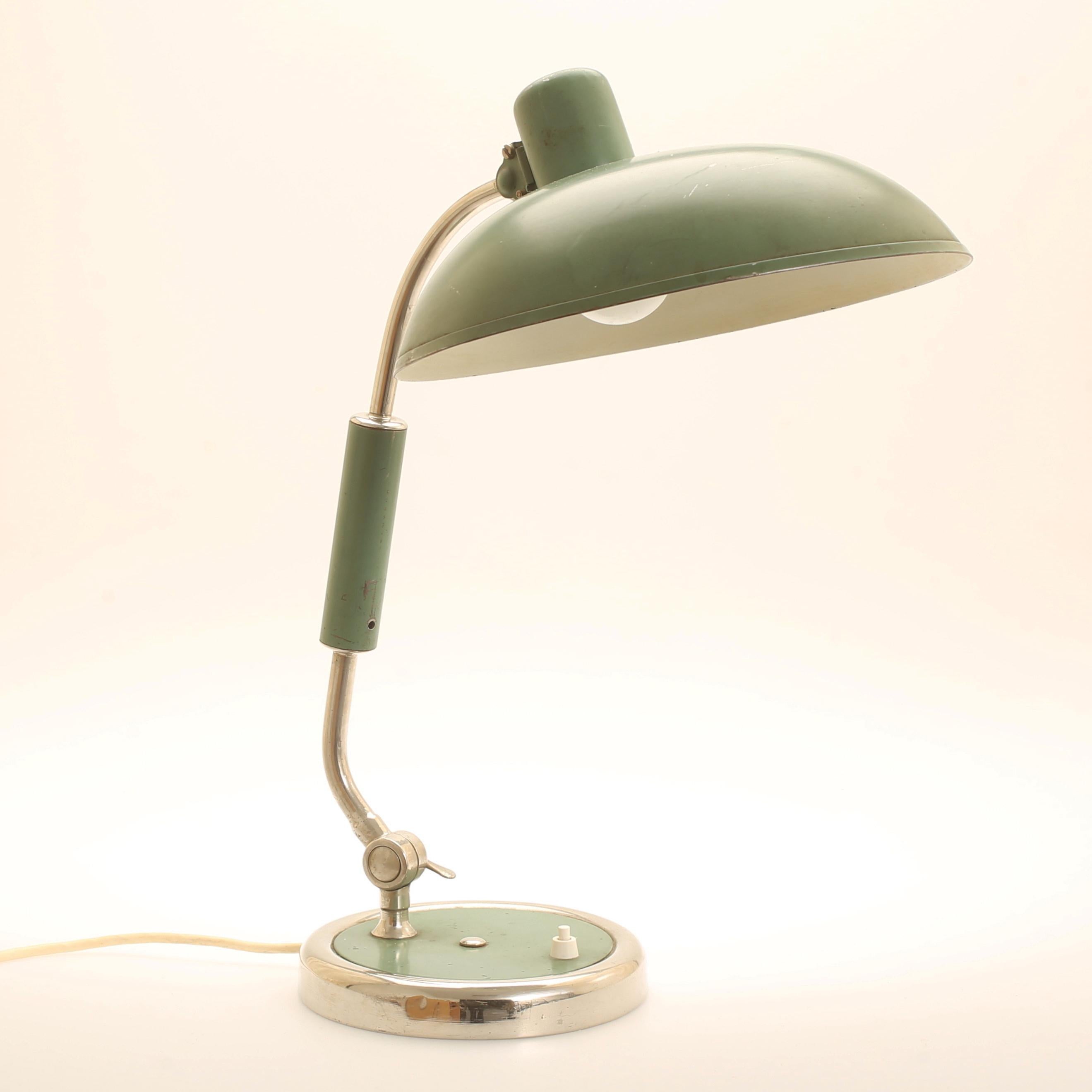 Bauhaus table lampe green laquered from the 1930s model 6632. Original condition
deivery time about 1-2 weeks