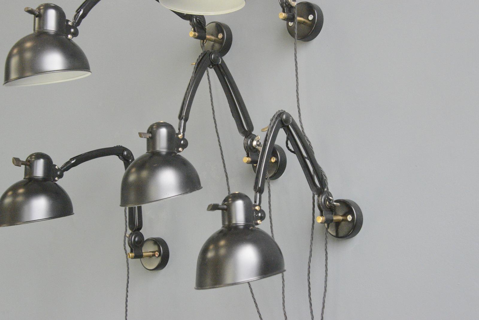 - Articulated arms and shade
- Takes E27 fitting bulbs
- Original bakelite On/Off toggle switch
- Designed by Christian Dell
- Produced by Kaiser Idell
- German ~ 1930s
- 16cm wide 12cm tall 
- Extends up to 60cm from the wall

Christian
