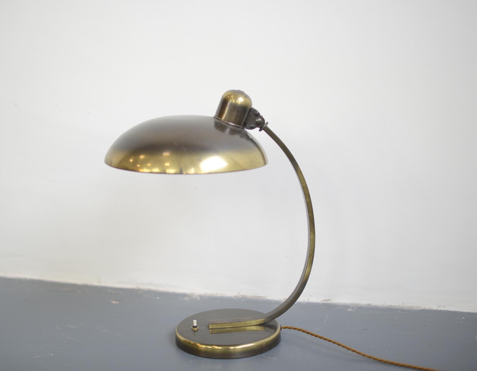 Kaiser Idell Model 6750, circa 1930s

- Brass shade, arm and base
- Takes E27 fitting bulbs
- On/Off switch on the base
- German ~ 1930s
- 36 cm wide x 46 cm tall x 26 cm deep

Christian Dell

Dell was born in Offenbach am Main in Hesse.
