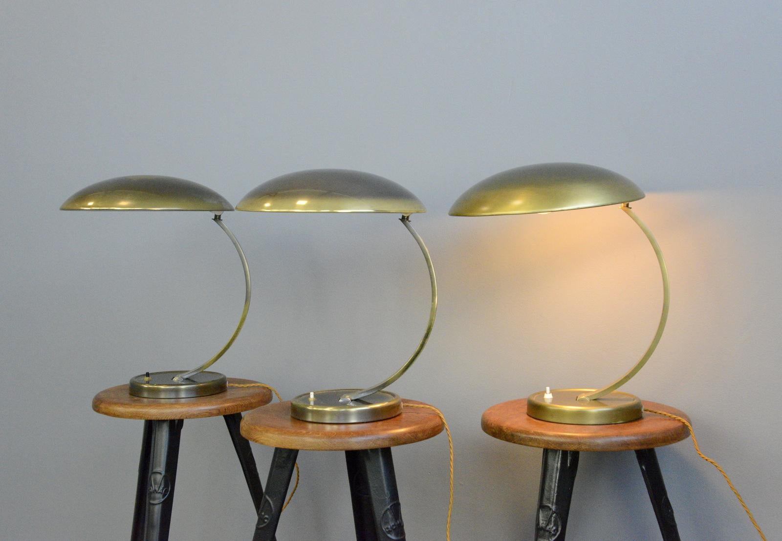 Kaiser Idell model 6751 table lamps, circa 1950s

- Price is per lamp
- Brass arm and shade
- On/Off switch on the base
- Adjustable arm and shade
- Takes E27 fitting bulbs
- German, 1950s
- 40cm tall x 35cm wide x 37cm 

Christian