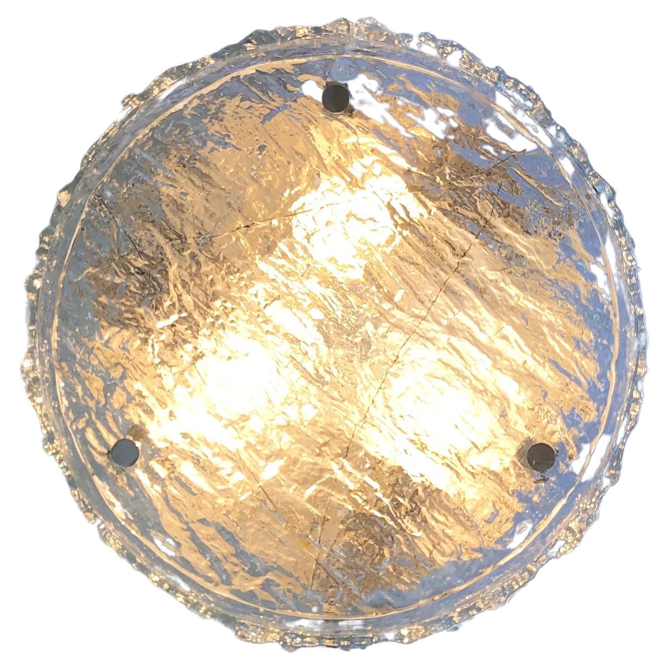 Magnificent, concealed base ceiling lamp by 'Kaiser Leuchten', Germans famous mid century manufacturer of high-end design lighting.
Comes in a round shape, hand made from transparent (no colour) Murano glas, also known as ‘ice glas’.
Thick glas