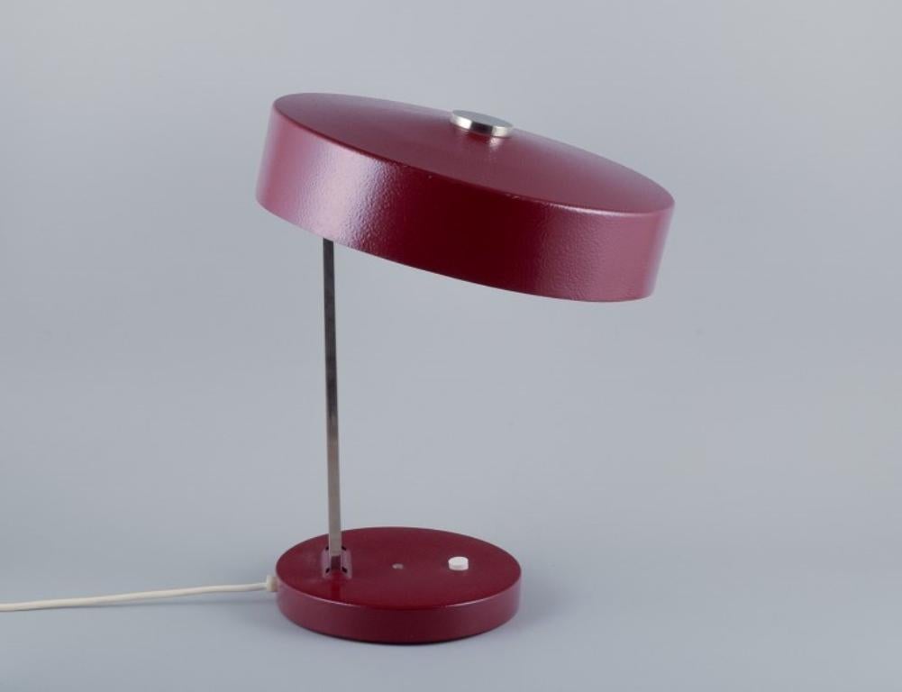Modern Kaiser Leuchten. Burgundy coloured desk lamp. 1960s. For Sale