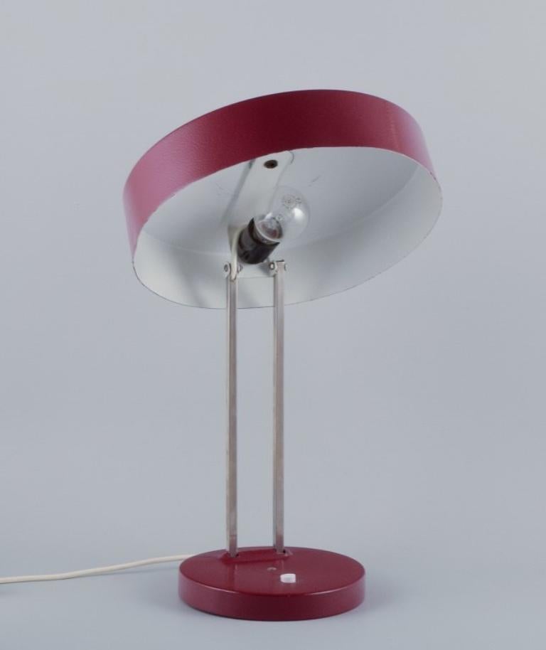 Mid-20th Century Kaiser Leuchten. Burgundy coloured desk lamp. 1960s. For Sale