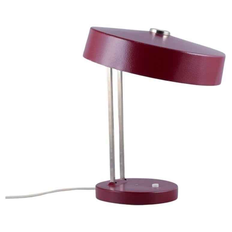 Kaiser Leuchten. Burgundy coloured desk lamp. 1960s.