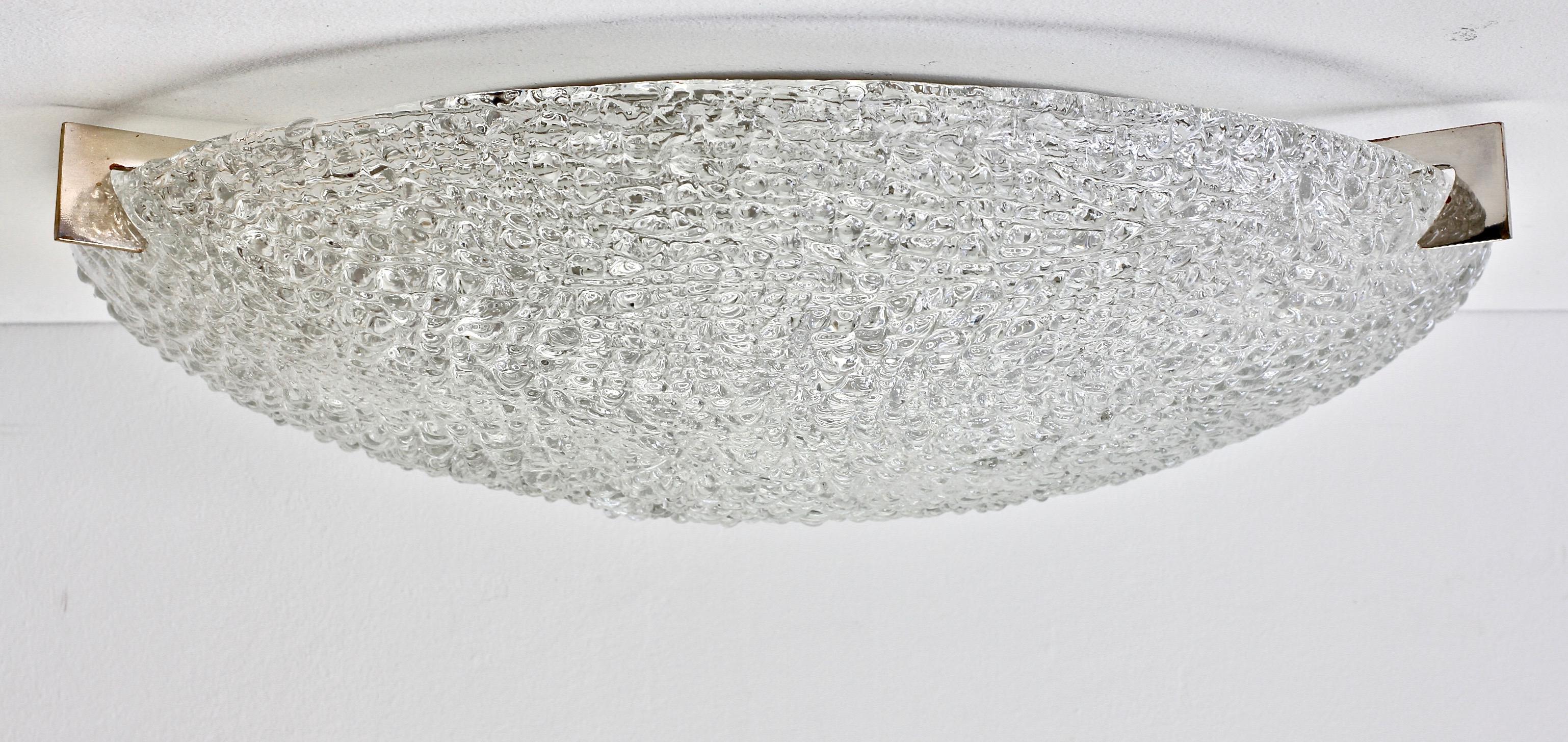 Large vintage 50cm (20 inch) round circular thick textured glass flush mount by midcentury German lighting manufacturer, Kaiser Leuchten, circa 1960s-1970s. Wonderfully formed 'ice' glass shade - gently moulded and formed in to a round, domed dish -