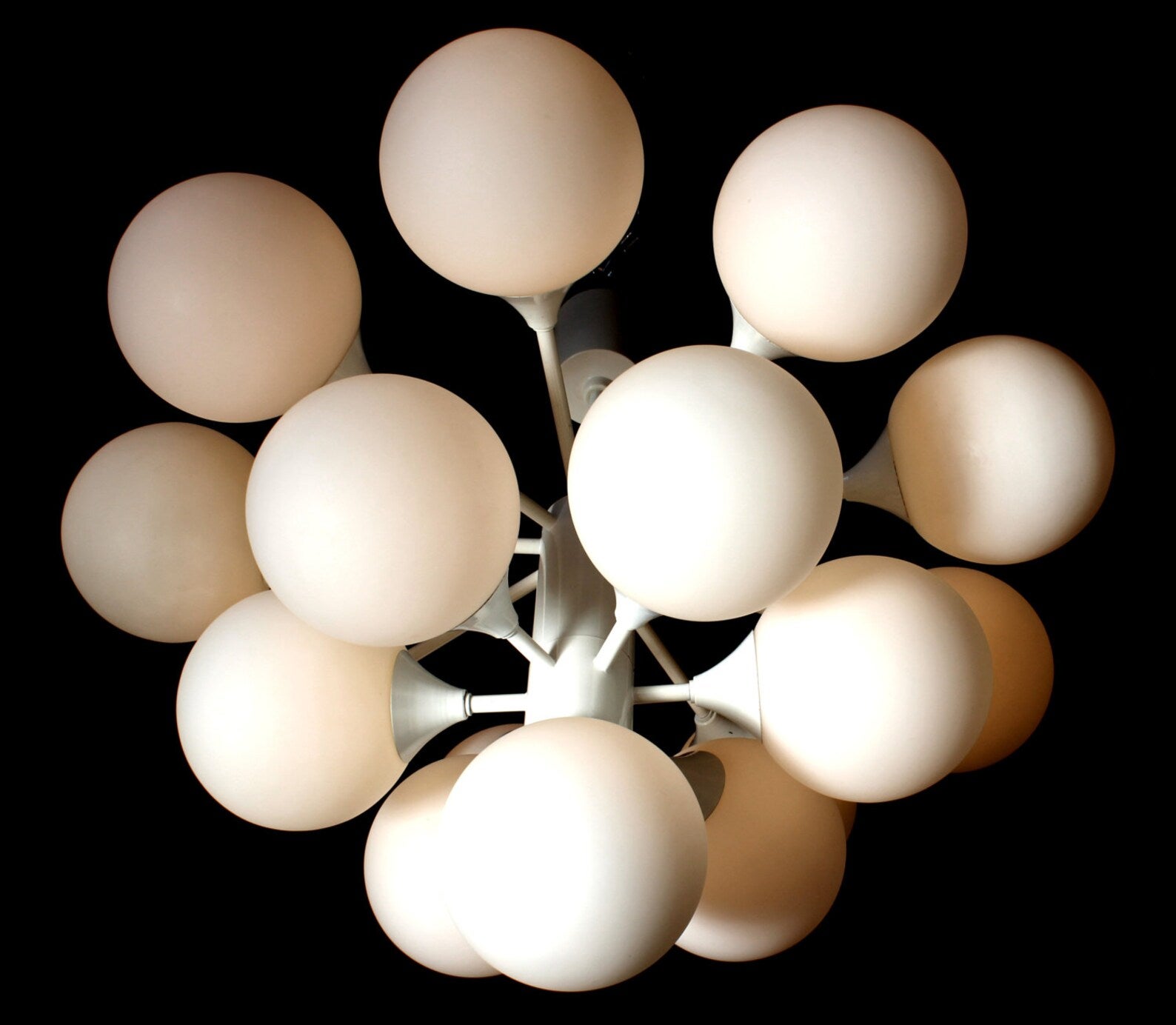Organic 16 lights (e14) opal glass globes chandelier by Kaiser Germany.

Measures: diameter 25,5