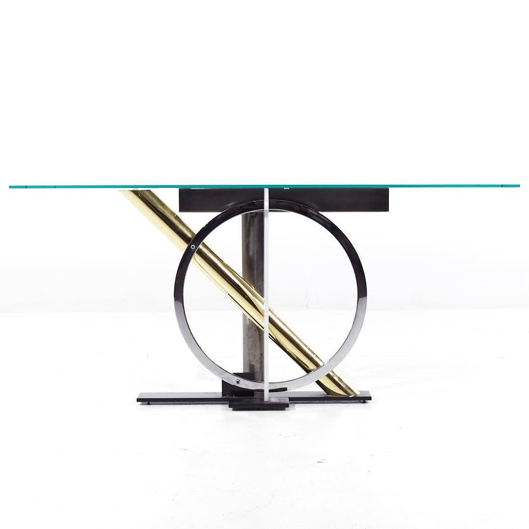 Kaizo Oto for Design Institute of America Postmodern Steel and Brass Console Table

This console table measures: 33.25 wide x 9 deep x 26.75 inches high

We take our photos in a controlled lighting studio to show as much detail as possible. We do