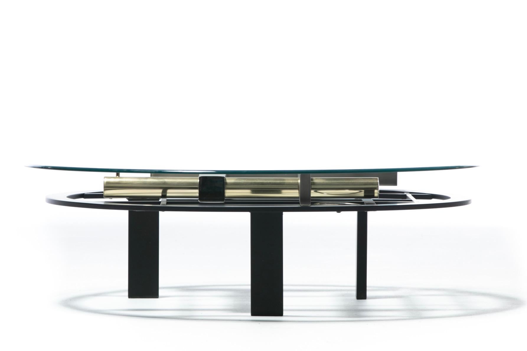 1980s Post modern mixed metal coffee table with geometric forms by designer Kaizo Oto for Design Institute of America. A great way to integrate or bring together mixed metals into your space, this Kaizo Oto coffee table features quite a bit of