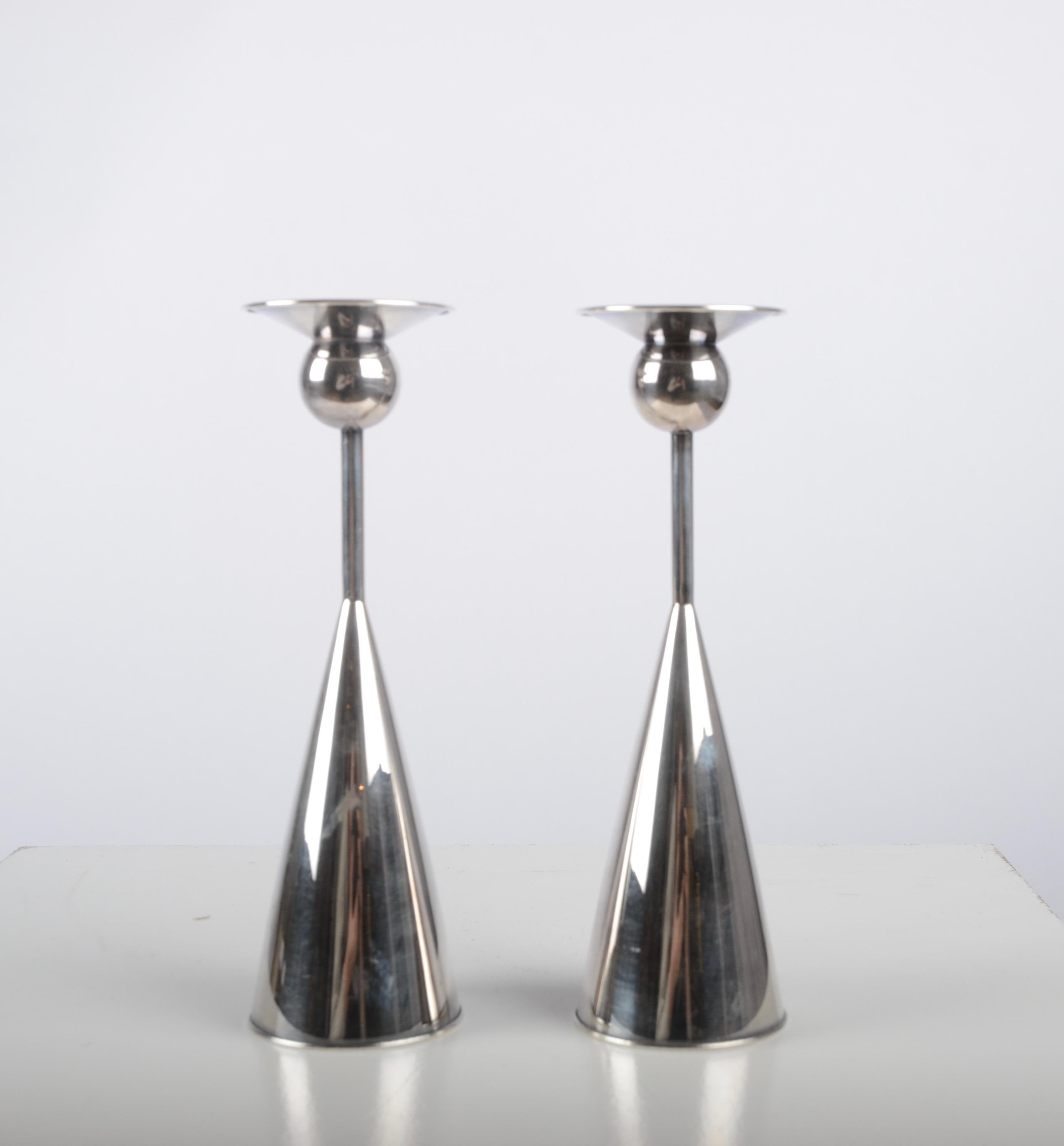 A pair of candlesticks in silver, designed by Kaj Blomqvist for Kultakeskus Tavastehus, Finland, 1966 (N7). Signed KB and finish hallmarks.