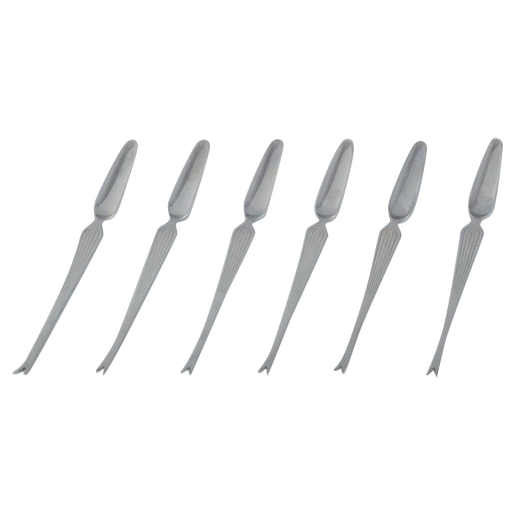 Kaj Franck for Hackman. Set of six "Scandia" lobster forks in stainless steel For Sale