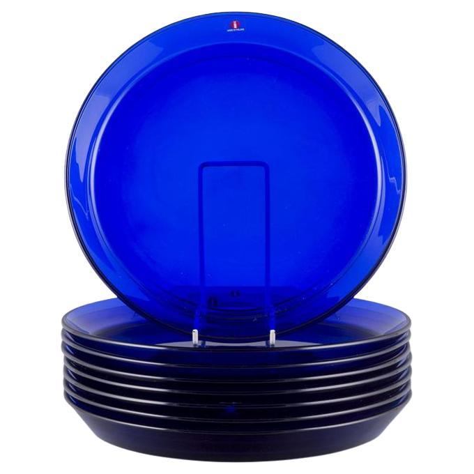 Kaj Franck for Iittala, Finland. Set of eight ‘Kartio’ plates in blue art glass.