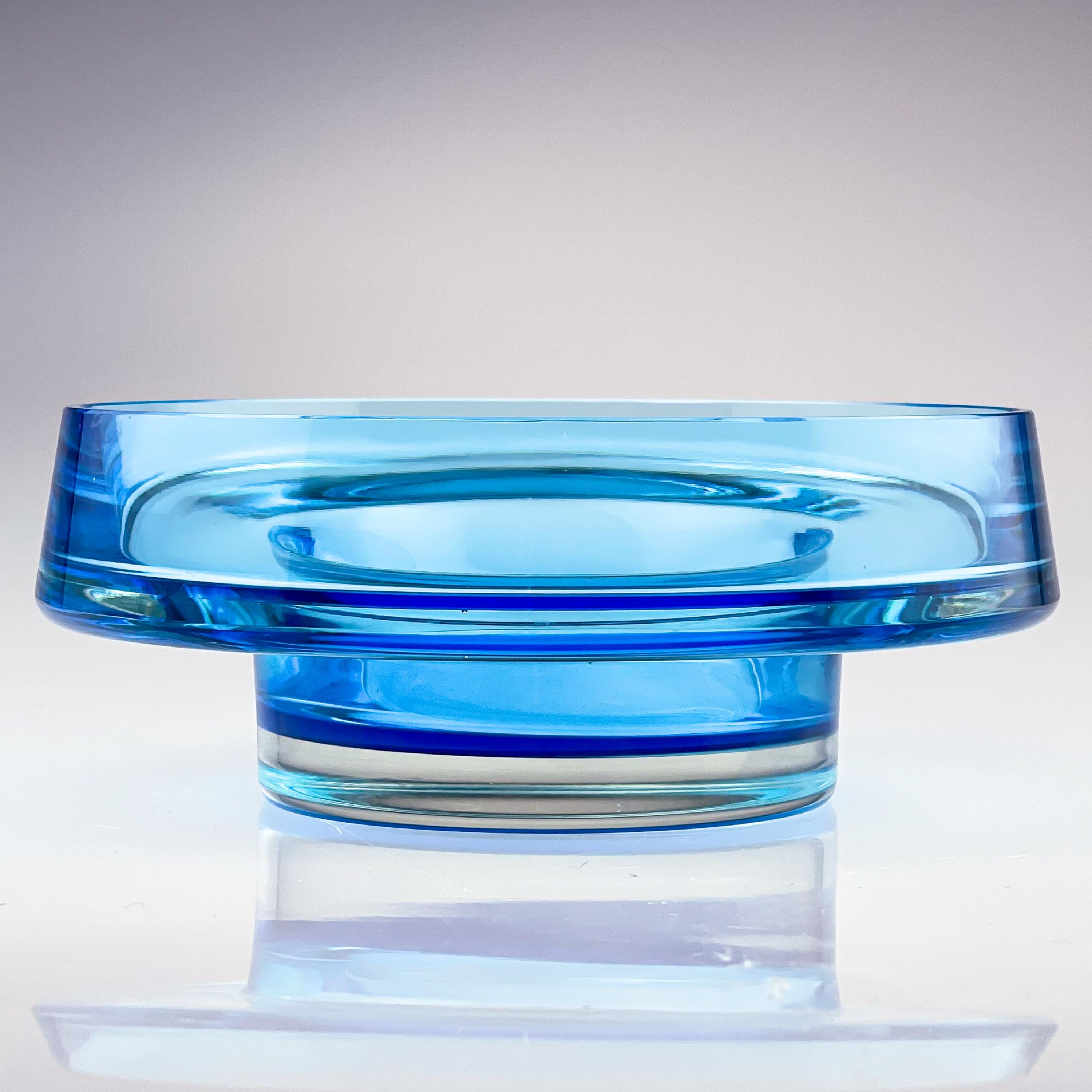 Kaj Franck, Glass Art-Object, Model KF261, Nuutajärvi-Notsjö, Finland, ca 1965

Description
A large round, topaz-blue and clear cased glass, moldblown, turned and cut art-object, model KF 261, designed by Kaj Franck in 1960, executed by the