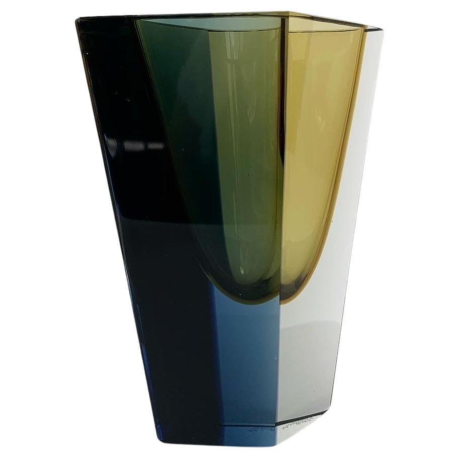 Outstanding glass piece by the Finnish master Kaj Franck, model ‚Prisma‘ for Nuutajärvi in Notsjö, Finland, 1964.

Mouth-blown and hand-polished crystal with a blue and yellow layer, resulting in a green tone. 

Signed on bottom with the artists