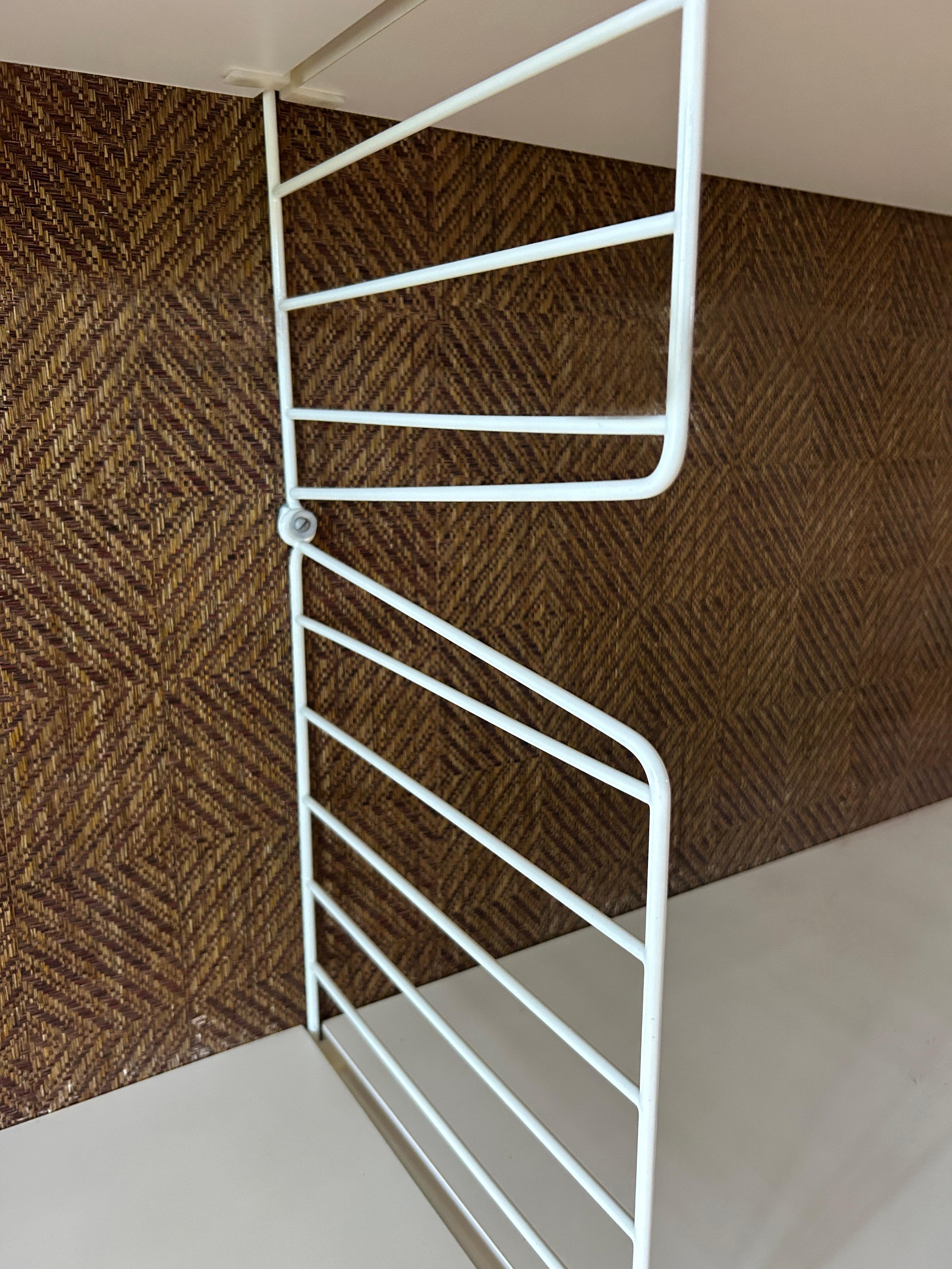 Kajsa & Nisse Strinning White Laminate 4 bay String wire wall shelf unit Sweden In Good Condition For Sale In Brooklyn, NY
