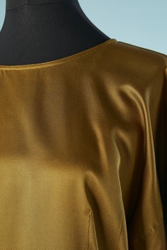 Kaki silk blouse with decorative  jewlery buttons on the cuffs Genny