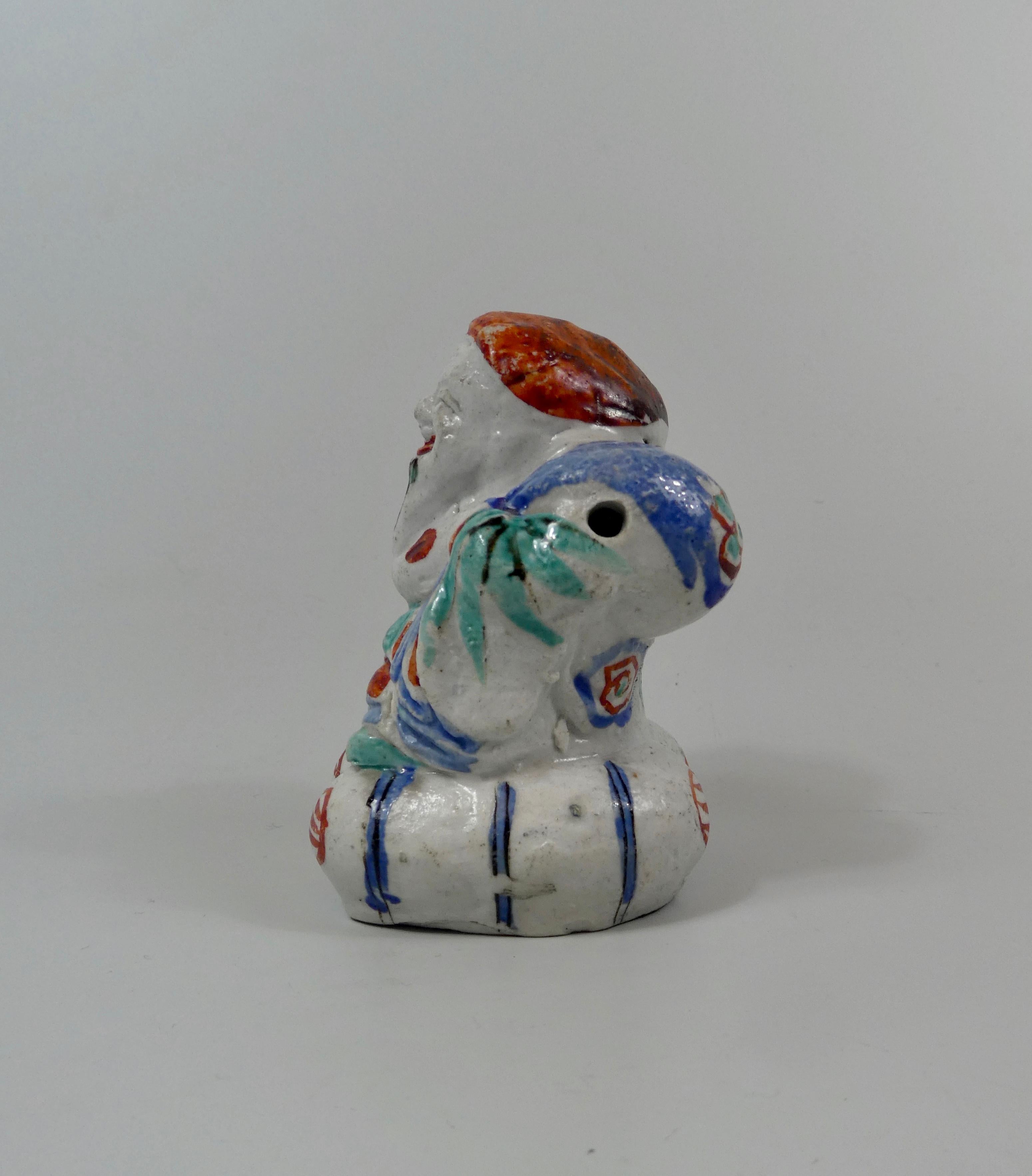 Fired Kakiemon Porcelain Water Dropper, Daikoku, circa 1680, Edo Period