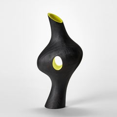 Kakra 0.2, a dark tulip wood sculpture with lime interior by Donald Baugh