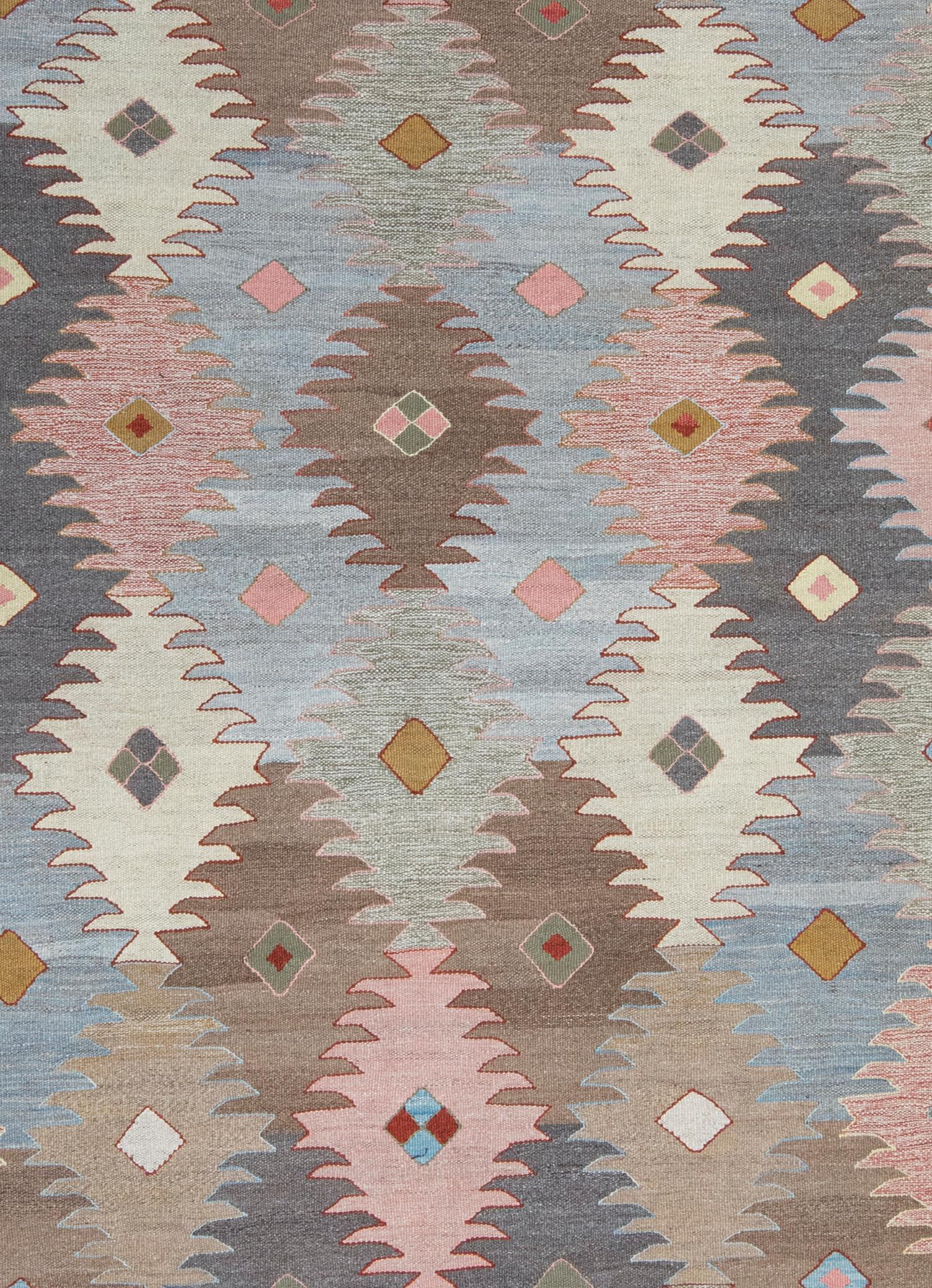 Our Kalach flatweave rugs resemble the rare and collectible antique Khalaj kilims by a Turkic group based south of Isfahan that were produced in the 19th century and earlier. Due to their limited availability, NASIRI revived the ancient dyeing and