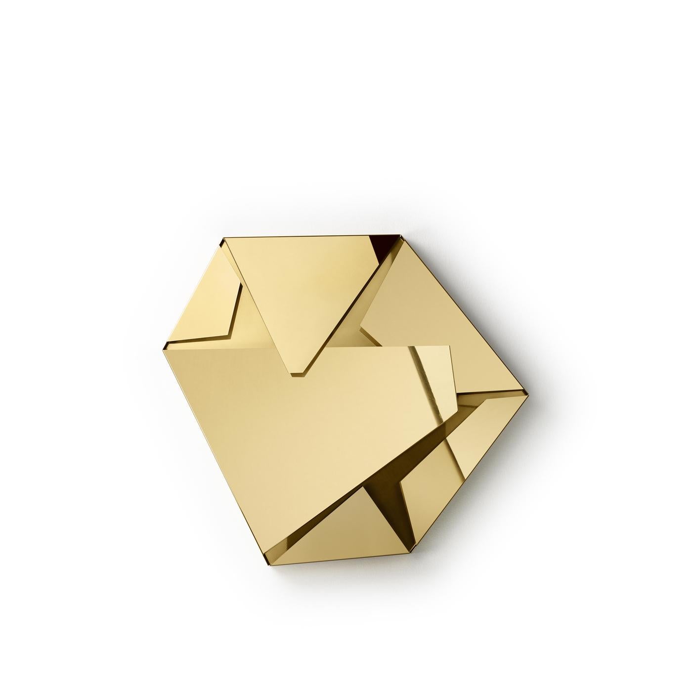 This striking wall light, designed by Campana Brother Sculptural, is comprised of six hinged mirror blades in stainless steel. The brass base and gilded mirrors create a kaleidoscope effects of golden reflections. The piece is backlit with 9-W LED