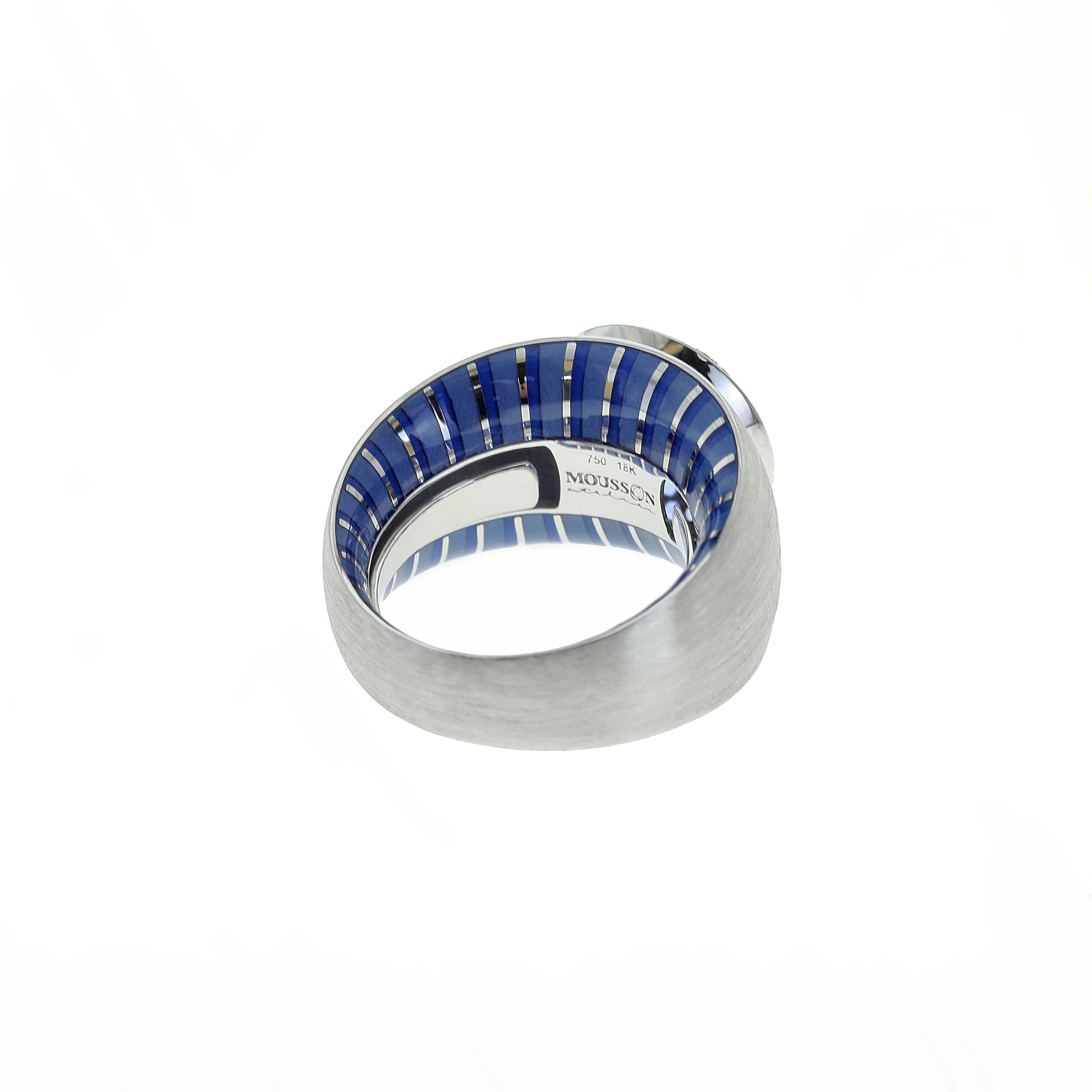 From our Kaleidoscope Collection - Blue Sapphire with Enamel, 18 Karat White Gold Ring. All outer surface with Silk Finishing. Enamel inside gives to this ring some hidden secret.

US Size 6 1/2
EU Size 52 3/4

24x14x27.3 mm
10.33 gm