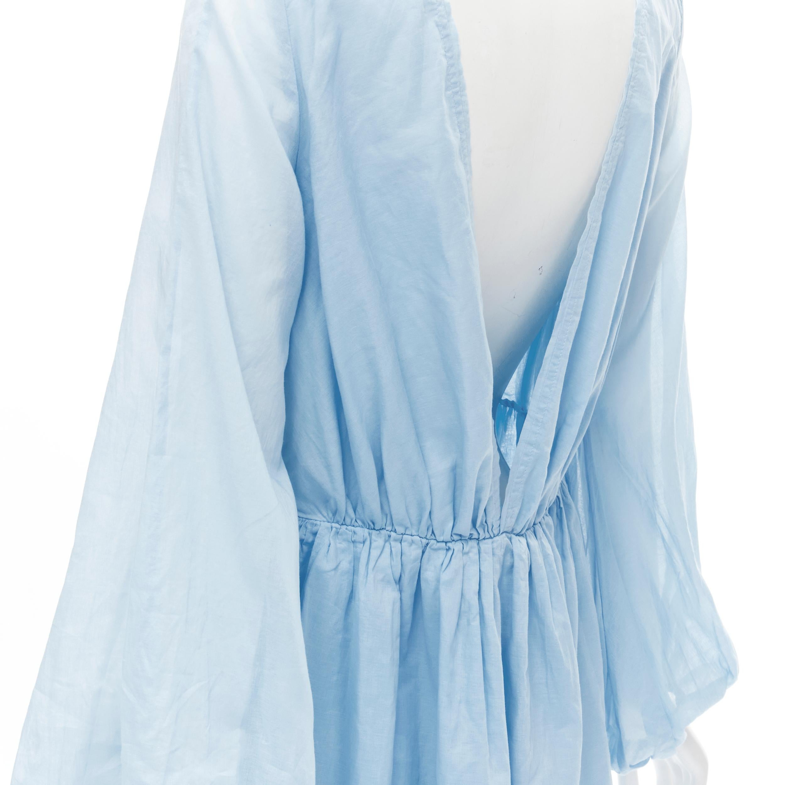 KALITA 100% cotton sky blue plunge neck bell sleeve short dress S/M
Brand: Kalita
Material: Cotton
Color: Blue
Pattern: Solid
Extra Detail: Plunge neck and back. Elasticated cuff.
Made in: Bali

CONDITION:
Condition: New with tags. 
Comes with: