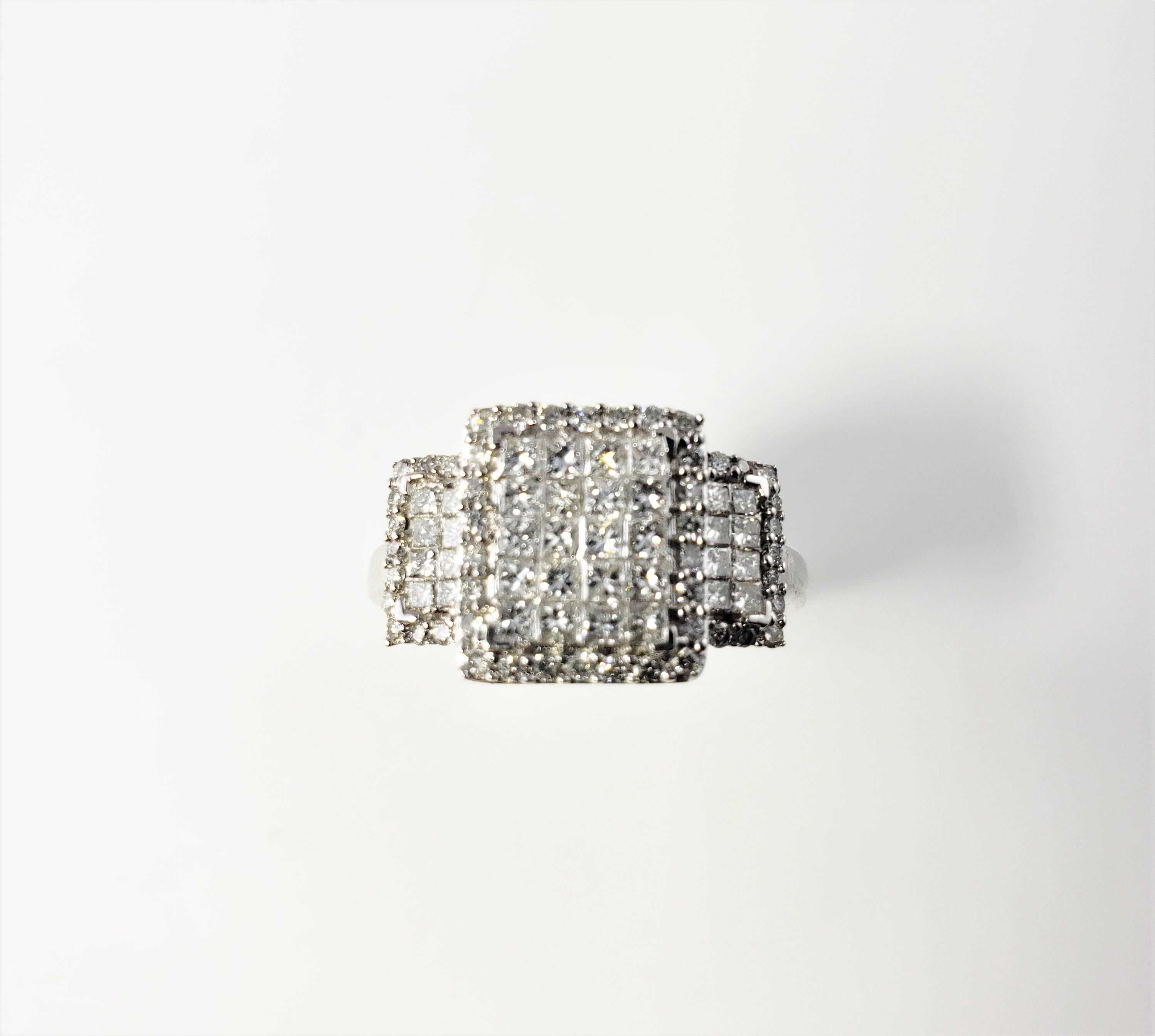 Vintage Kallati 14 Karat White Gold and Diamond Ring Size 9-

This stunning ring features 36 princess cut diamonds and 48 round brilliant cut diamonds set in beautifully detailed 14K white gold.  Top of ring measures 11 mm x 17 mm.  Shank measures 2