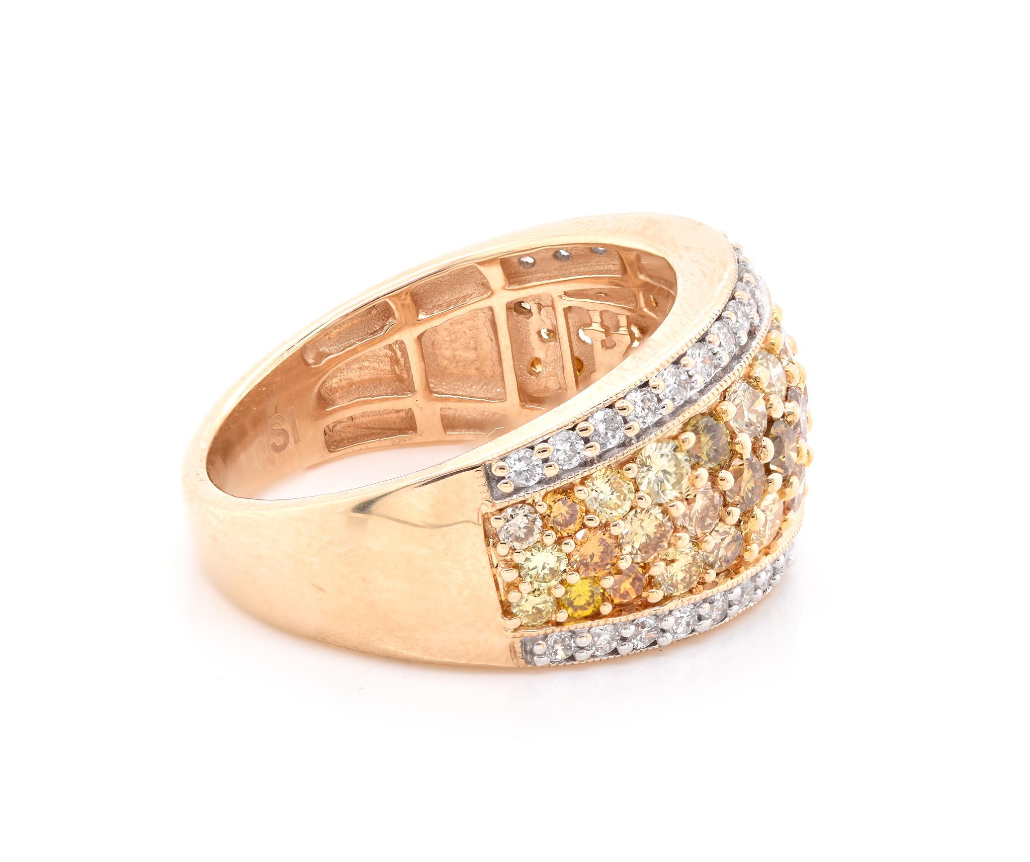 Designer: Kallati
Material: 14K yellow gold
Diamond: 38 round cut = .38cttw
Color: G
Clarity: SI1
Diamond: 44 round cut = 1.20cttw
Color: Fancy
Clarity: SI1
Size: 7.5
Weight: 6.21 grams
