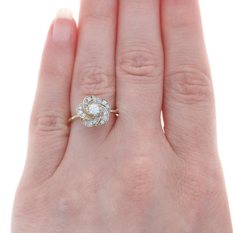 Retail Price: $1,520

Size: 6 3/4
Sizing Fee: Down 3 sizes for $30 or up 2 sizes for $35

Brand: Kallati

Metal Content: 9k Yellow Gold & 9k White Gold

Stone Information
Natural Diamond Solitaire
Carat: .20ct
Cut: Round Brilliant
Color: G
Clarity: