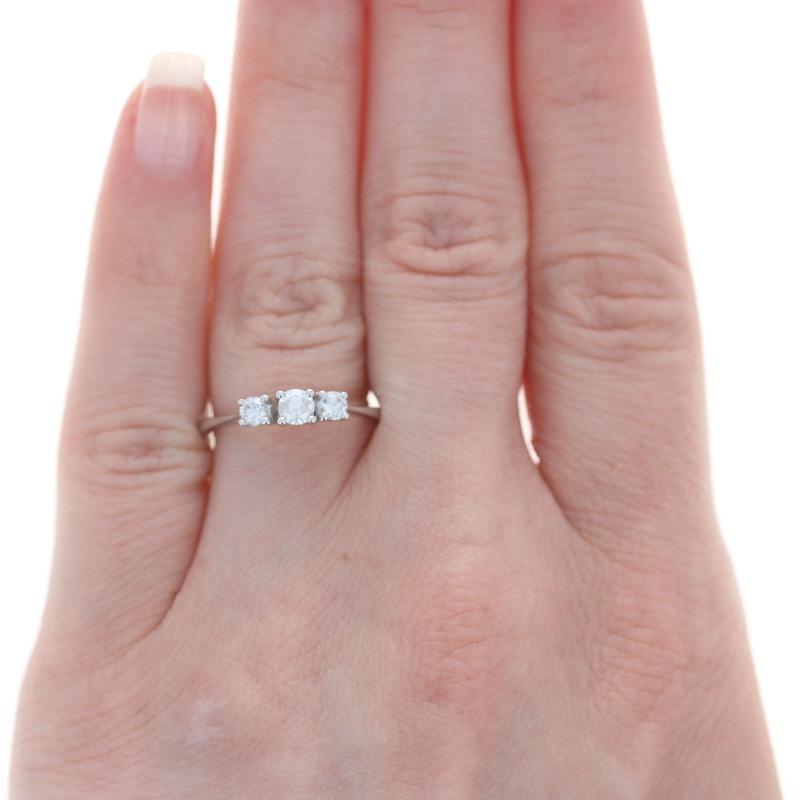 Retail Price: $1600

Size: 7
Sizing Fee: Down 2 sizes for $30 or up 2 sizes for $35

Designer: Kallati

Metal Content: 9k White Gold

Stone Information
Natural Diamond Solitaire
Carat: .20ct
Cut: Round Brilliant 
Color: H
Clarity: I1
Diameter:
