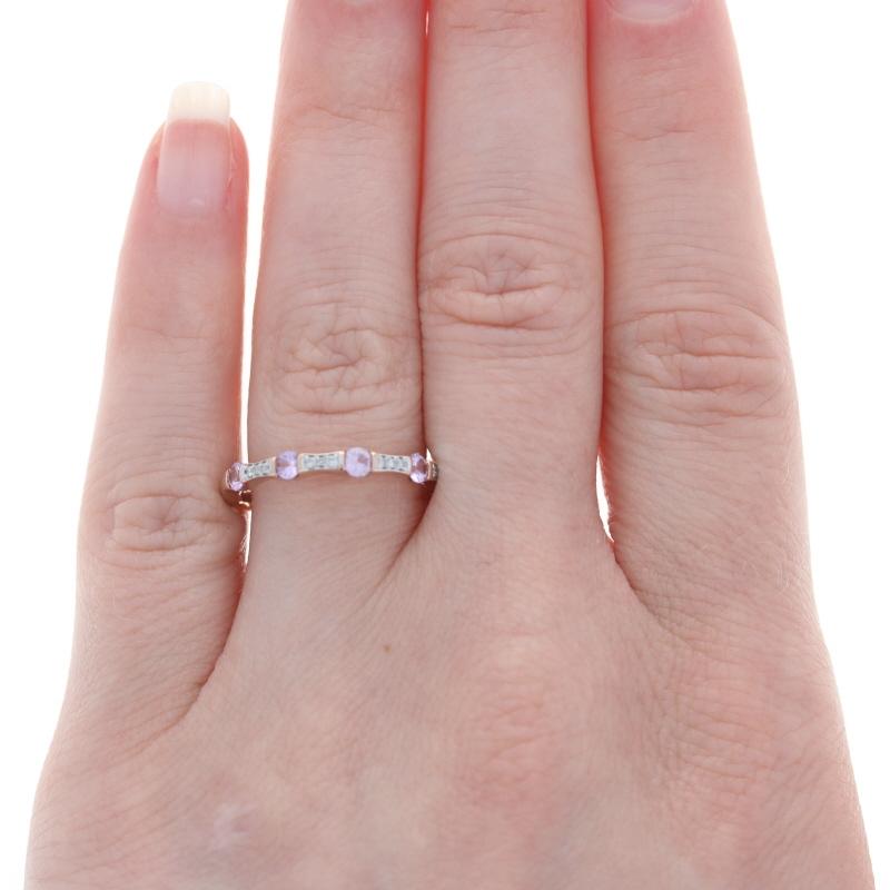 Retail Price: $900

Size: 7
Sizing Fee: Up 2 for $45

Brand: Kallati

Metal Content: 9k Rose Gold & 9k White Gold

Stone Information
Natural Sapphires
Treatment: Heating
Carat(s): .60ctw
Cut: Round
Color: Pink

Natural Diamonds
Carat(s): .05ctw
Cut: