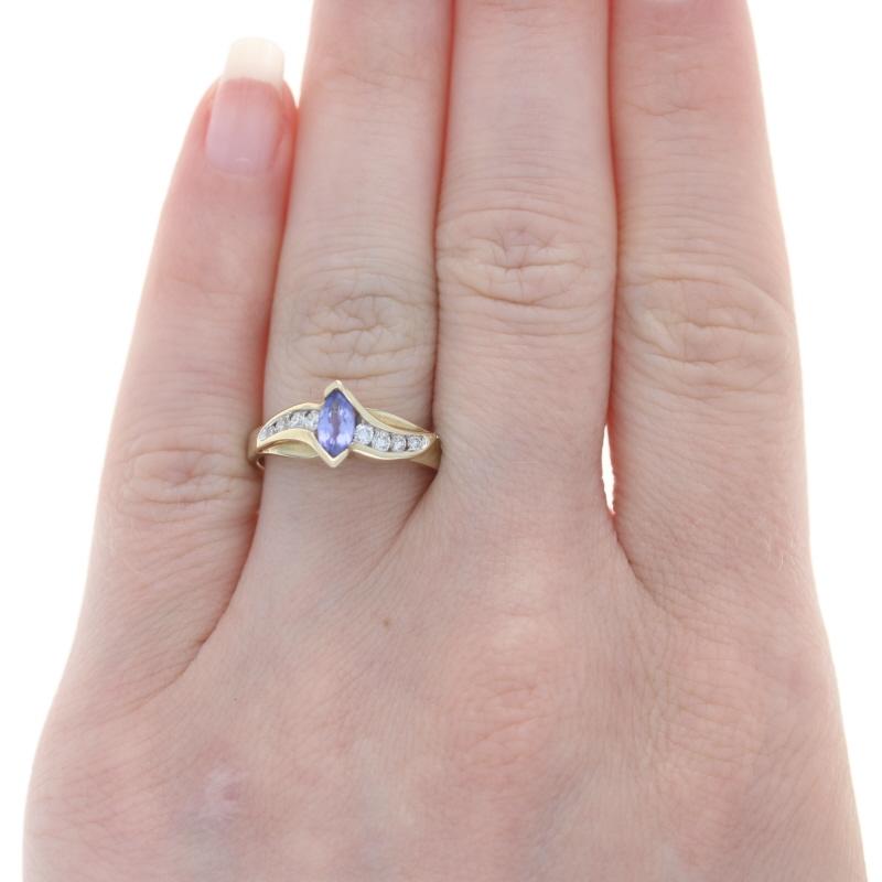 Retail Price: $990

Size: 6 3/4
Sizing Fee: Down 1 for $30 or up 2 for $35

Designer: Kallati

Metal Content: 9k Yellow Gold & 9k White Gold

Stone Information
Genuine Tanzanite
Treatment: Routinely Enhanced
Carat(s): .30ct
Cut: Marquise
Color: