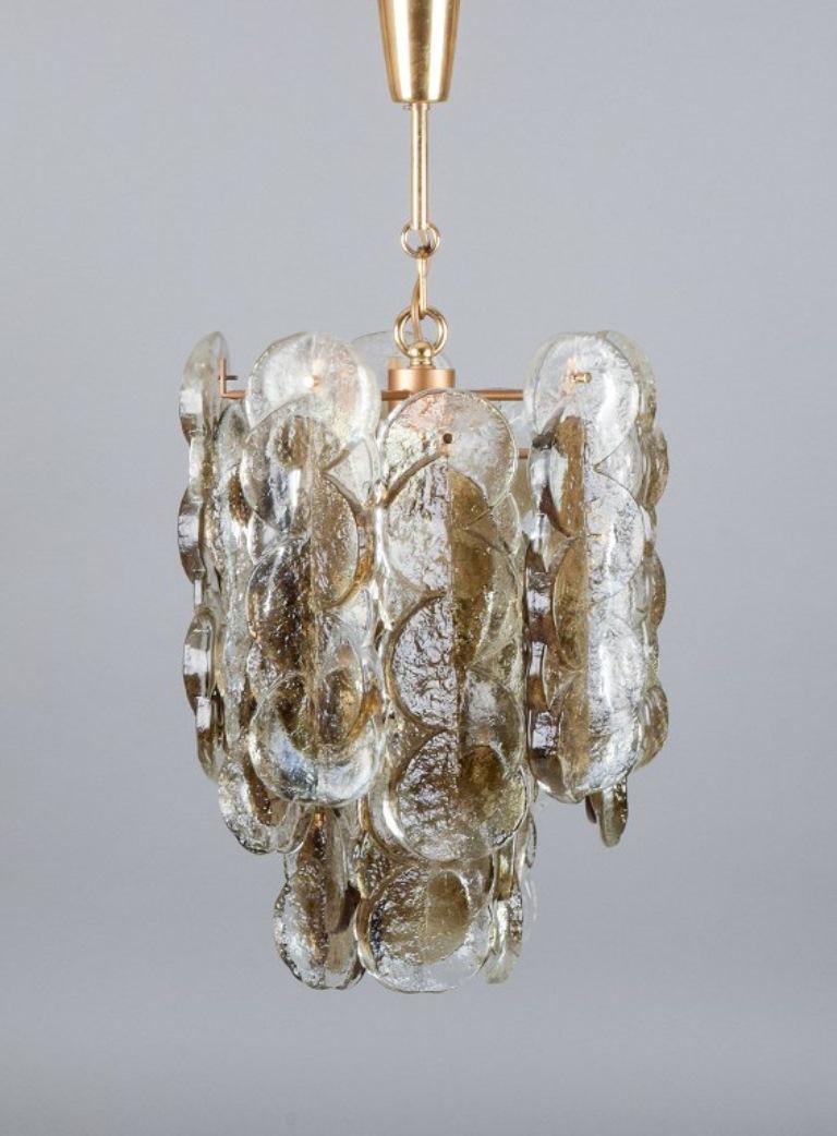 Kalmar, Austria.
Ceiling lamp in art glass for six bulbs. Clear and light brown mouth-blown glass. 
1970s.
In perfect condition.
Dimensions: H 72.0 cm with the suspension x D 33.0 cm.