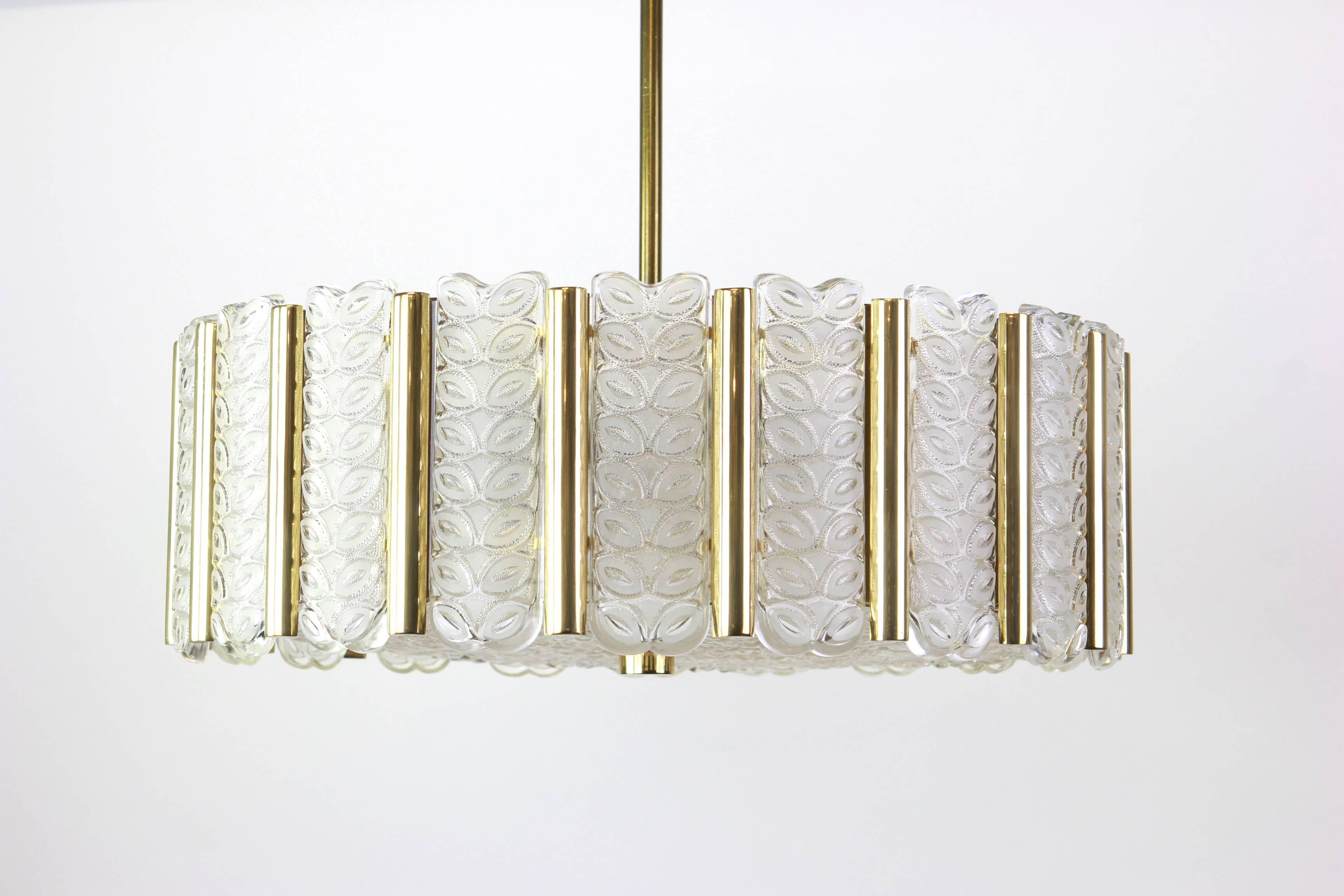 Gold-plated drum-shaped chandelier with 24 frosted glass panels on a brass frame with a wonderful pattern. Made by Kalmar, Austria. 

High quality and in very good condition. Cleaned, well-wired and ready to use. 

The fixture requires 9 x E14