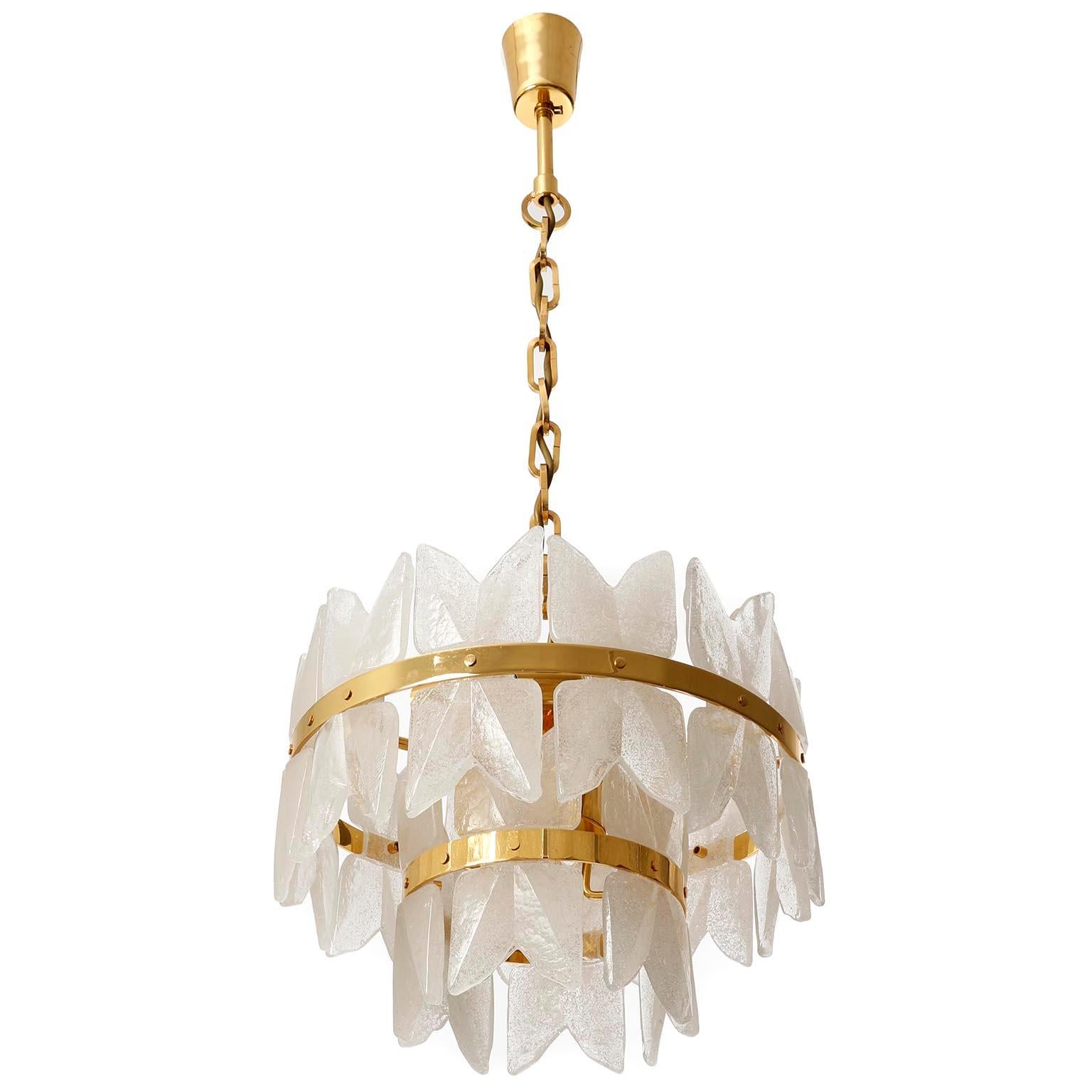 A very exclusive Hollywood regency ice glass chandelier or pendant light model 'Corina' no. 3970 by J.T. Kalmar, Vienna, Austria, manufactured in midcentury, circa 1970 (late 1960s or early 1970s).
A high quality piece which is made of a 24-carat
