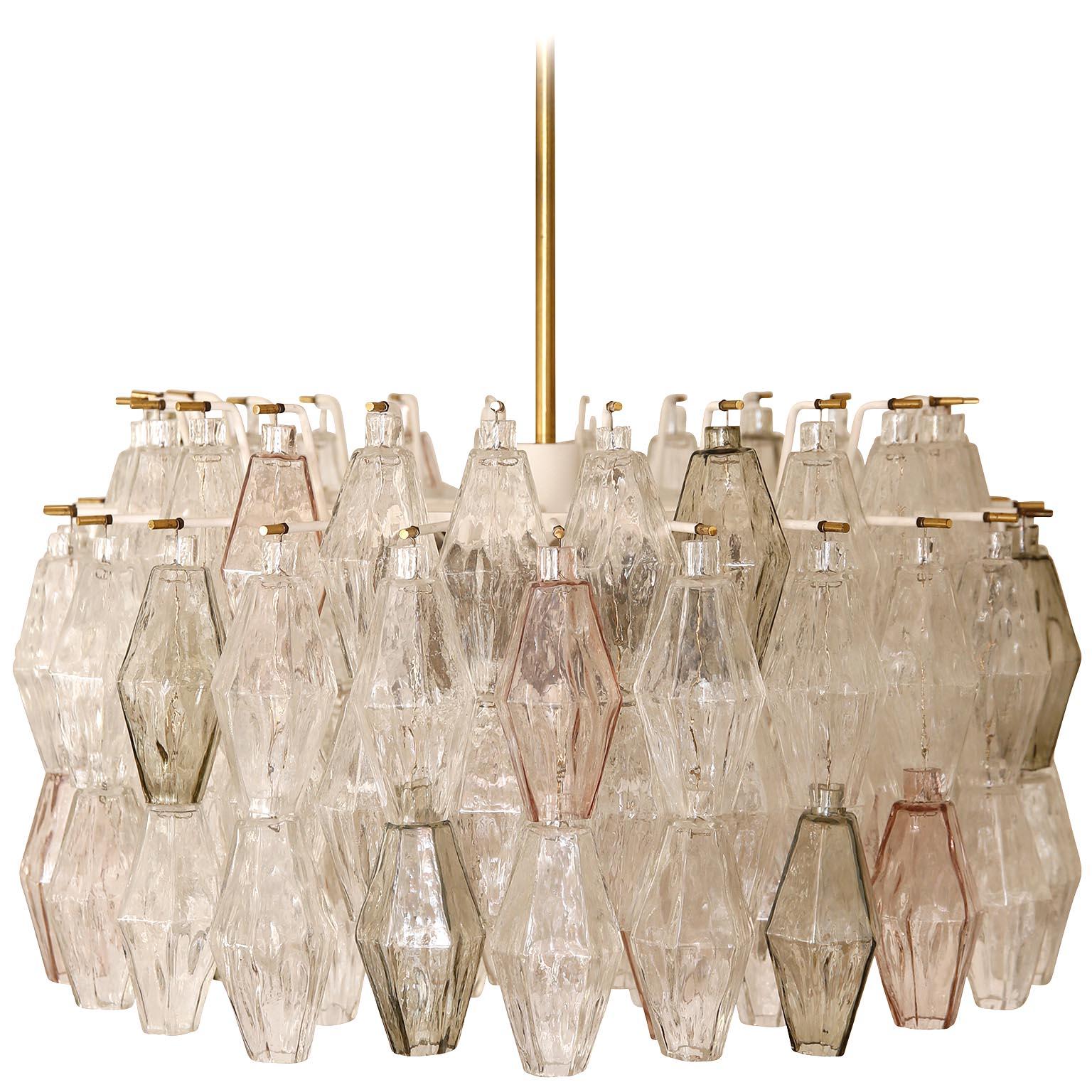 A gorgeous and rare light fixture model 'Polyeder 126 HL', model no. 3830 by J.T. Kalmar, Austria, manufactured in midcentury, circa 1960.
Hand blown diamond shaped Murano glasses ('poliedri' or 'polyhedral') from the Italian glass manufacturer