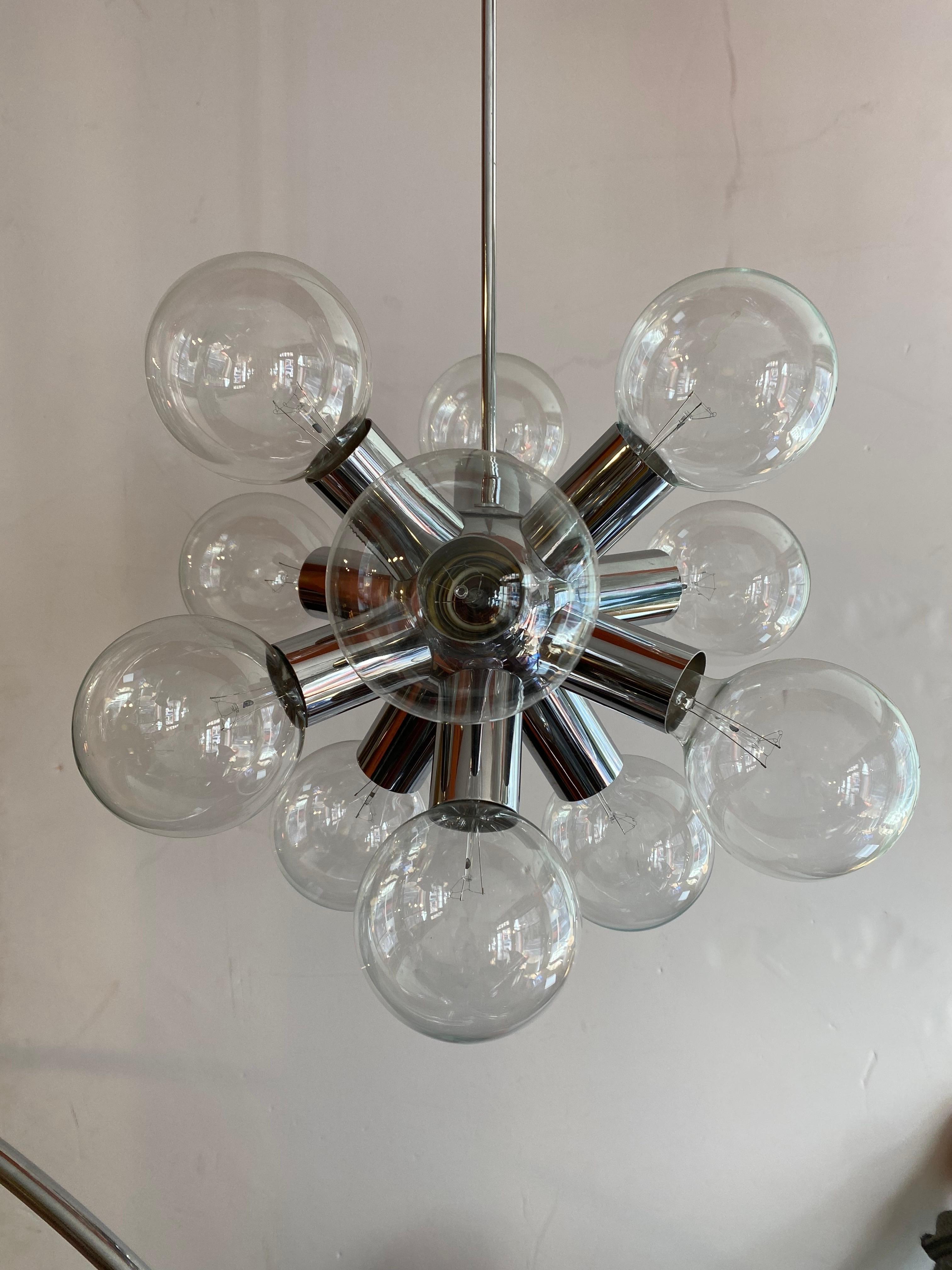 Kalmar Atomic Aluminum Chandelier.  Round lightbulbs make the fixture anything you want it to be!  white, clear or even round balls with 1/2 chrome tops all look amazing in this fixture.  Dates to the late 1960's.  In very nice shape, includes
