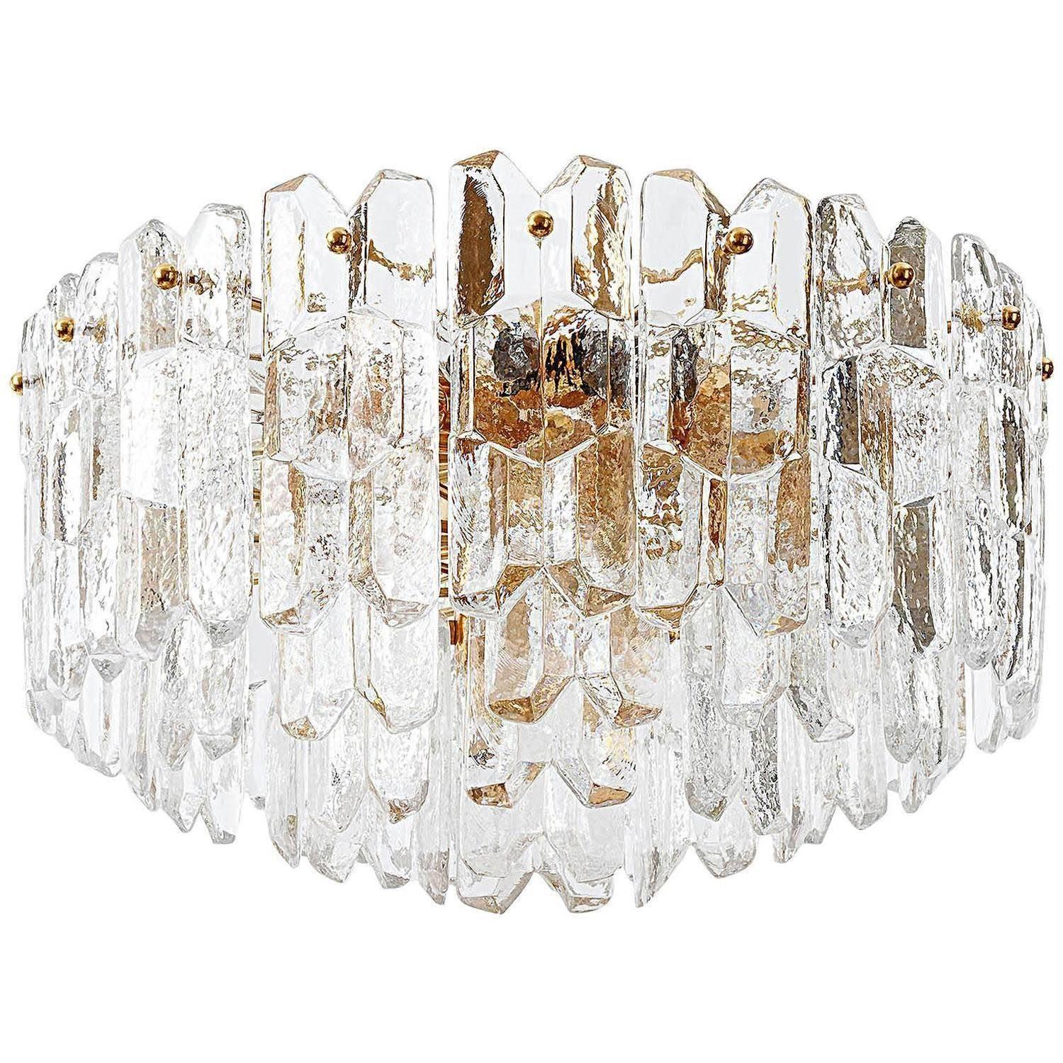 A very exquisite 24-carat gold-plated brass and clear brilliant glass flush mount lights by J.T. Kalmar, Vienna, Austria, manufactured in midcentury, circa 1970 (late 1960s and early 1970s).
The model name is 'Palazzo'. The light is marked with a