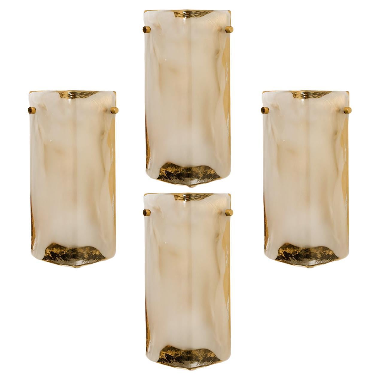 1 Of the 4 high end wall sconces made of hand blown clear and white Murano glass on a chrome hardware designed and produced by J.T. Kalmar, Austria in the 1960s. Minimalistic design executed with a taste for excellence in craftsmanship. Statement