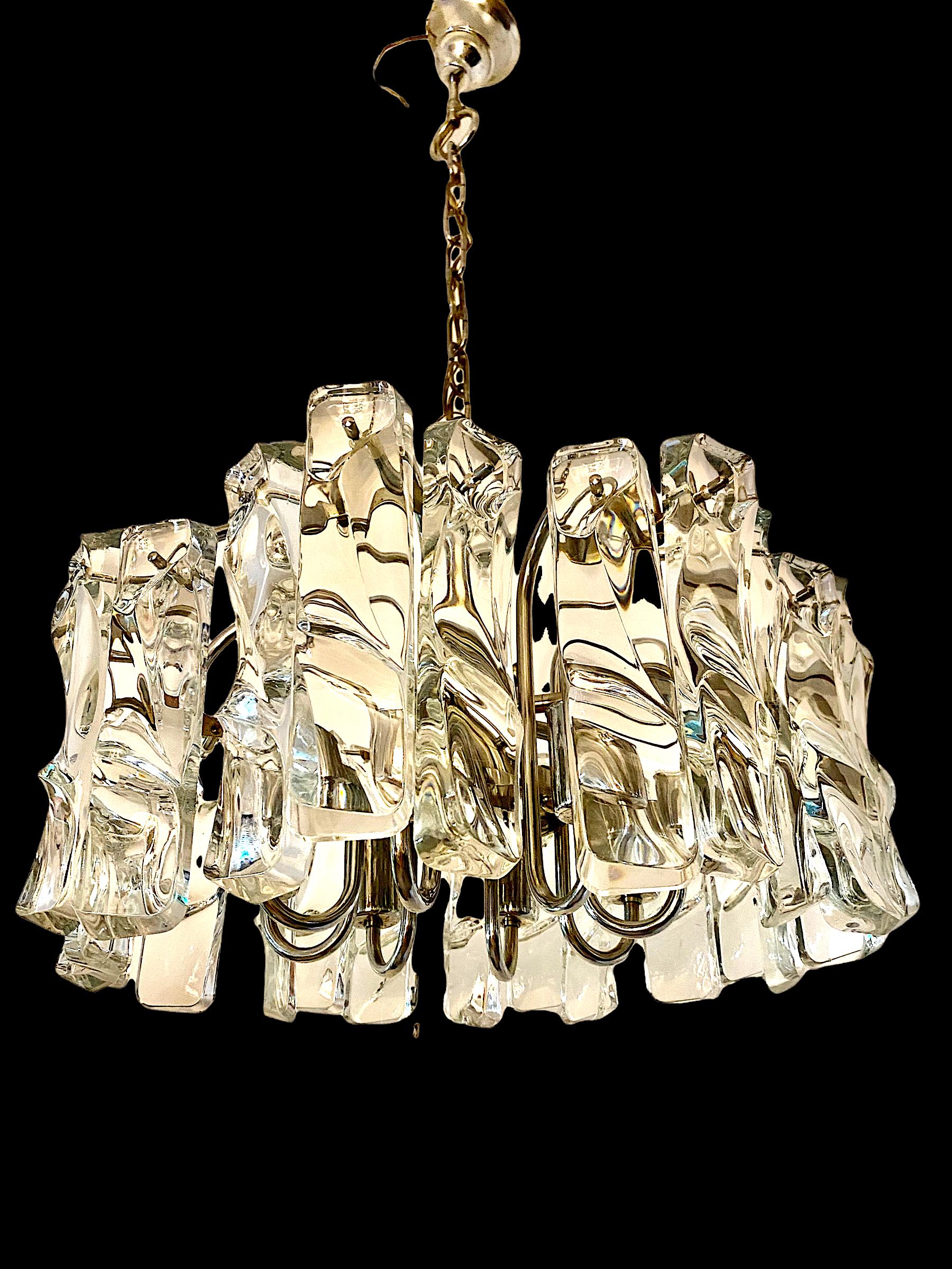 Exceptional JT Kalmar chandelier with large ice frost glass with chrome structure. The Design and the quality of the glass make this piece the best of the Austrian Design .
This unique Kalmar chandelier in ice frost glass are exceptional.

This