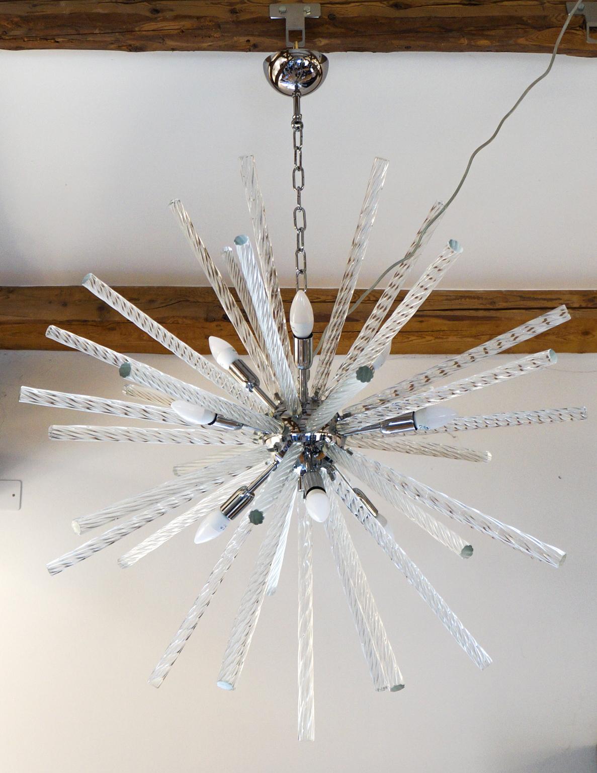 Designed in 1982 by Kalmar, this chandelier has 41 crystal glass elements called “Torciglioni”. 
Perfect for a modern space, the chandelier reach the diameter of 90 cm and is lighted by 9 Bubs E14 that create a comfortable atmosphere lighting with