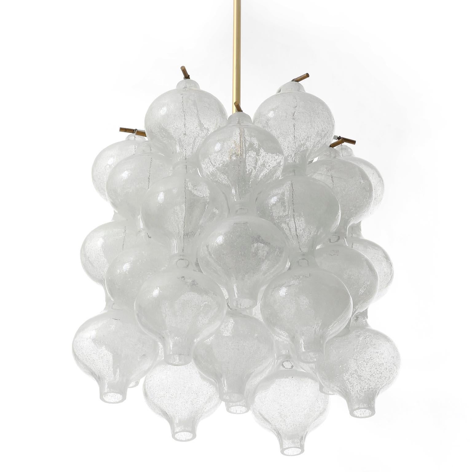 One of two fantastic light fixtures model Tulipan by J.T. Kalmar, Vienna, Austria, manufactured in midcentury, circa 1970 (late 1960s or early 1970s).
The name Tulipan derives from the tulip shaped hand blown bubble glasses. Each glass is handmade