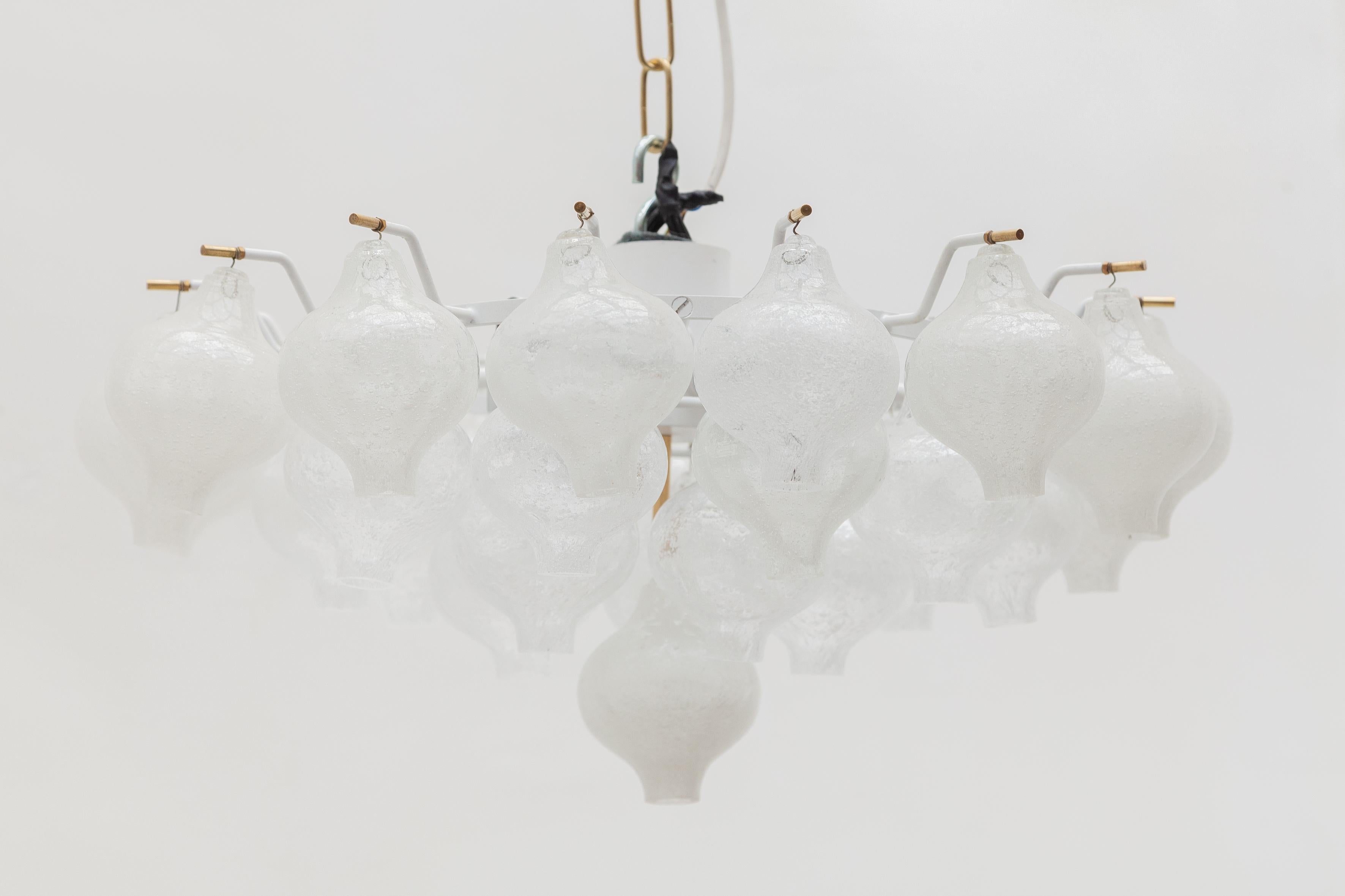 Large flush-mount with Tulipan designed glass models was manufactured by J.T. Kalmar. It features a metal white lacquered frame with brass details, ten bulbs and Murano hand-blown glass Tulipans. The chandelier is in excellent vintage condition with