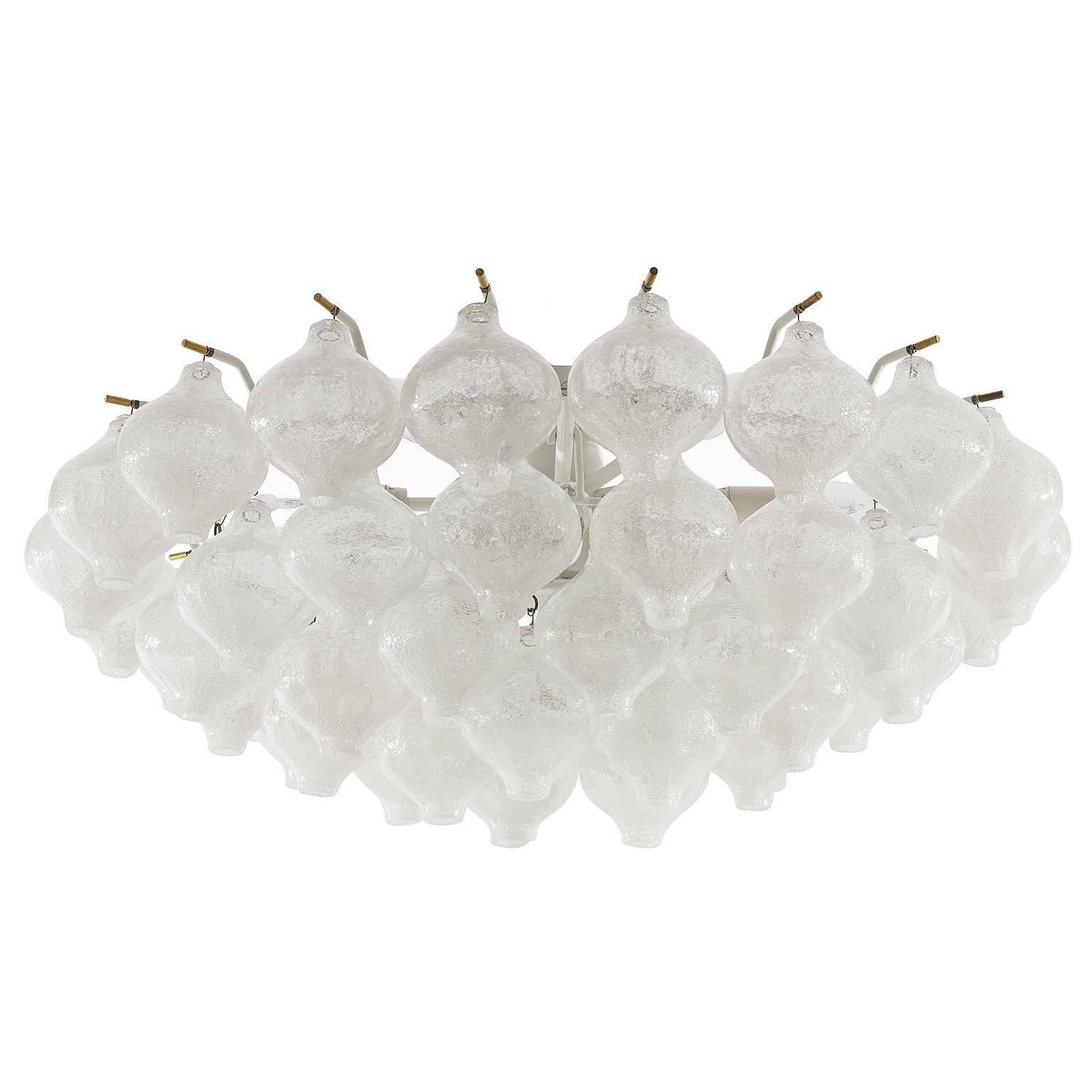 A large and fantastic 'Tulipan' flush mount chandeliers by J.T. Kalmar, Austria, Vienna, manufactured in midcentury, circa 1970 (late 1960s or early 1970s).
The name Tulipan derives from the tulip shaped hand blown bubble glasses. Fifty glasses are