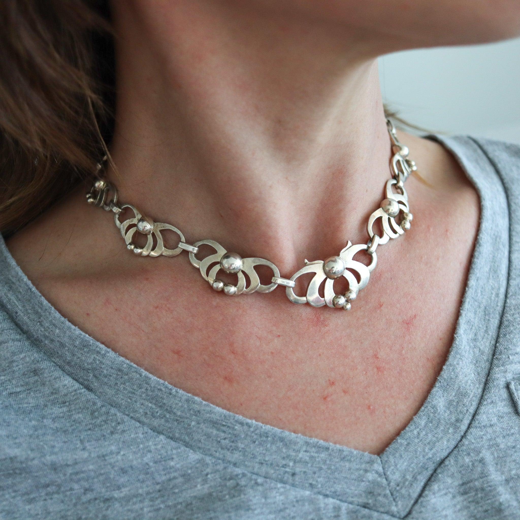 An art deco sterling necklace designed by KALO.

This is a very rare necklace created in Chicago United States during the art & craft period, back in the 1910. The beautiful necklace has been crafted by the KALO jewelry company in solid .925/.999