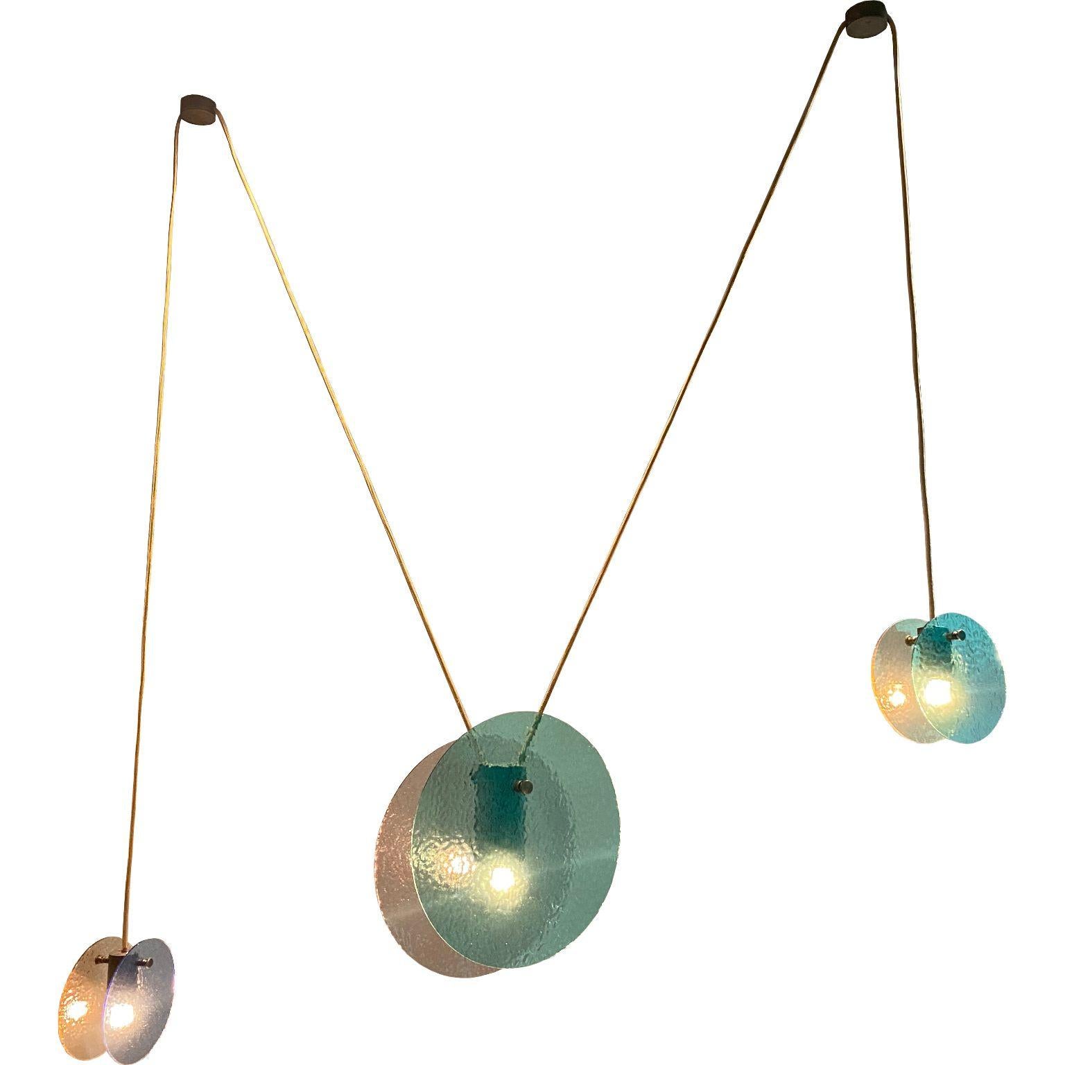 Kalupso small ceiling light by Moure Studio
Dimensions: D150 x H80 cm
Materials: glass and patinated brass
Also available in different dimensions. 

Our Kalupso chandelier is inspired by the Greek nymph of the sea. This name also evokes the