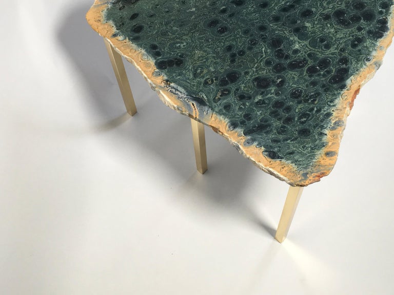Coffee table with top in Kabamba jasper from Madagascar and with five brass legs designed and produced by Studio Superego in 2018. Unique piece.

Superego editions were born in 2006, performing a constant activity of research in decorative arts by
