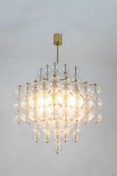 Kamenicky Senov. Chandelier made of blown glass and gilded brass. 1970s.